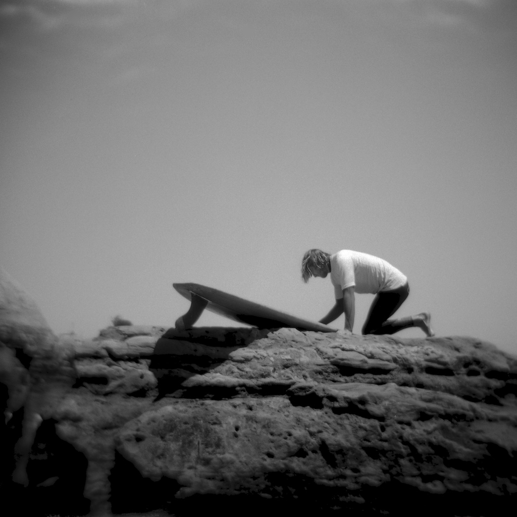 [#037709] Waxing his board, Logjam 2013, Santa Cruz, USA, 2013