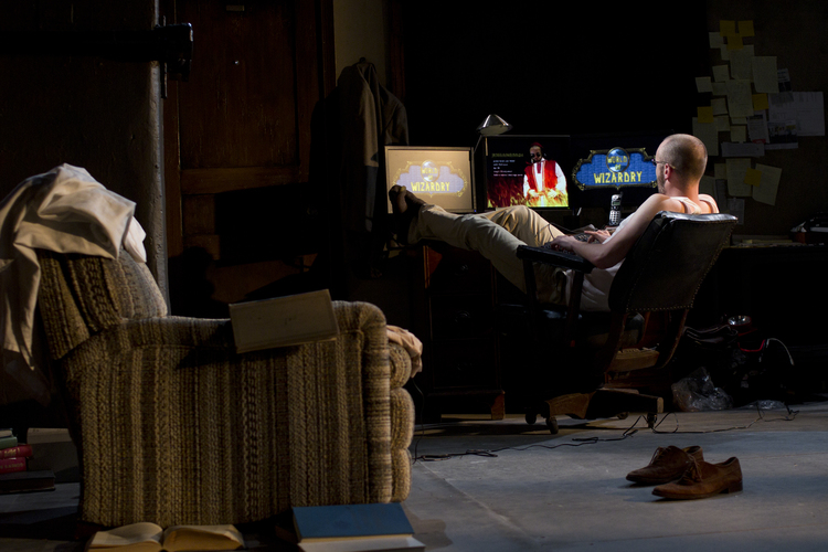 Playing a game on the computer ' The Life and Death of Doctor Faustus' 2015