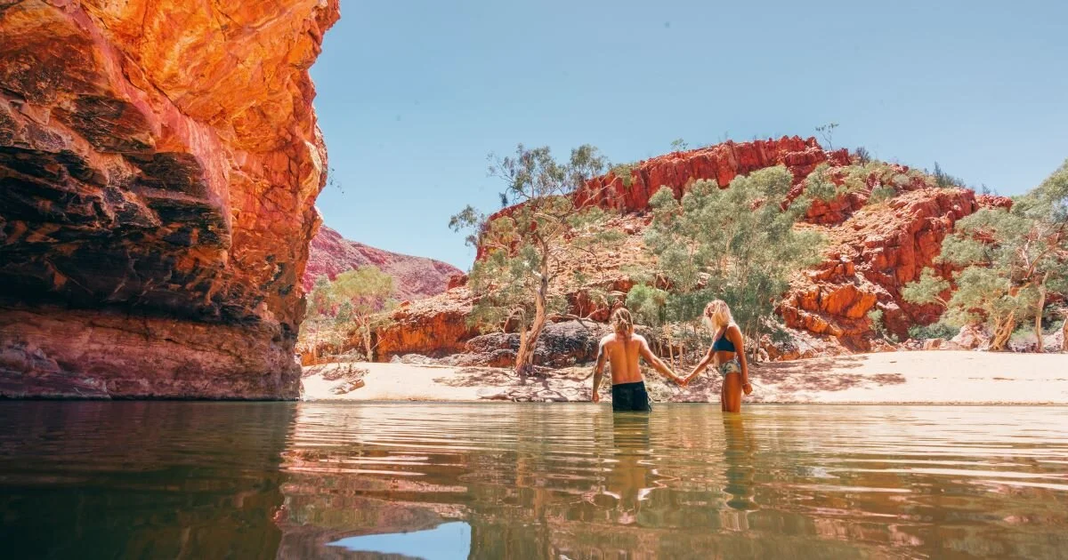 A_couple_taking_a_dip_at_Ormiston_Gorge_near_Alice_Springs.jpg