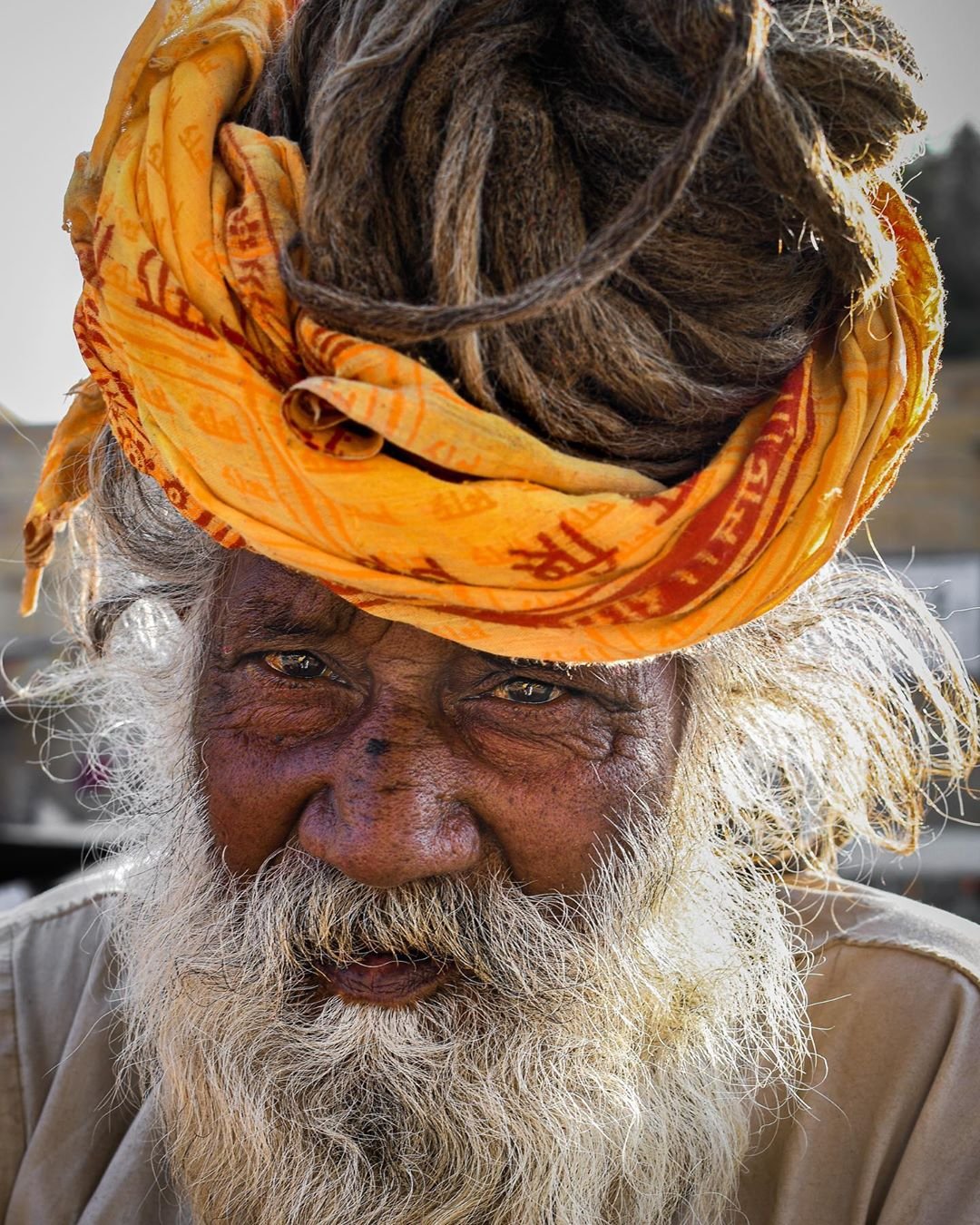 man in orange turban by @thousandstrangers.jpg