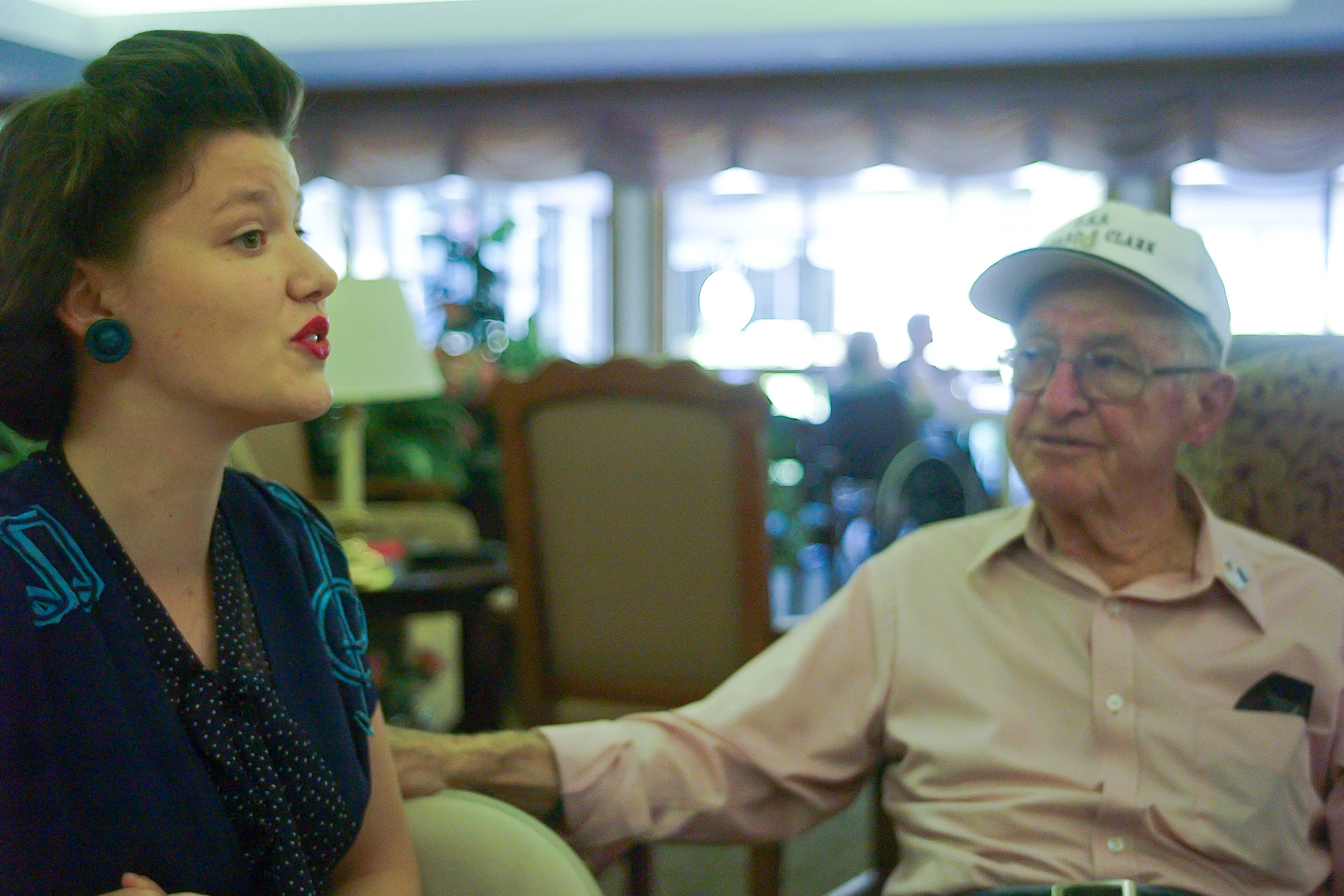 Faith sang everywhere we went. Here she is singing "White Cliffs of Dover" to WWII Veteran Armand Carlucci. It was so wonderful to watch the veteran's faces as she sang the songs of their time. Often times, they would join in with her.