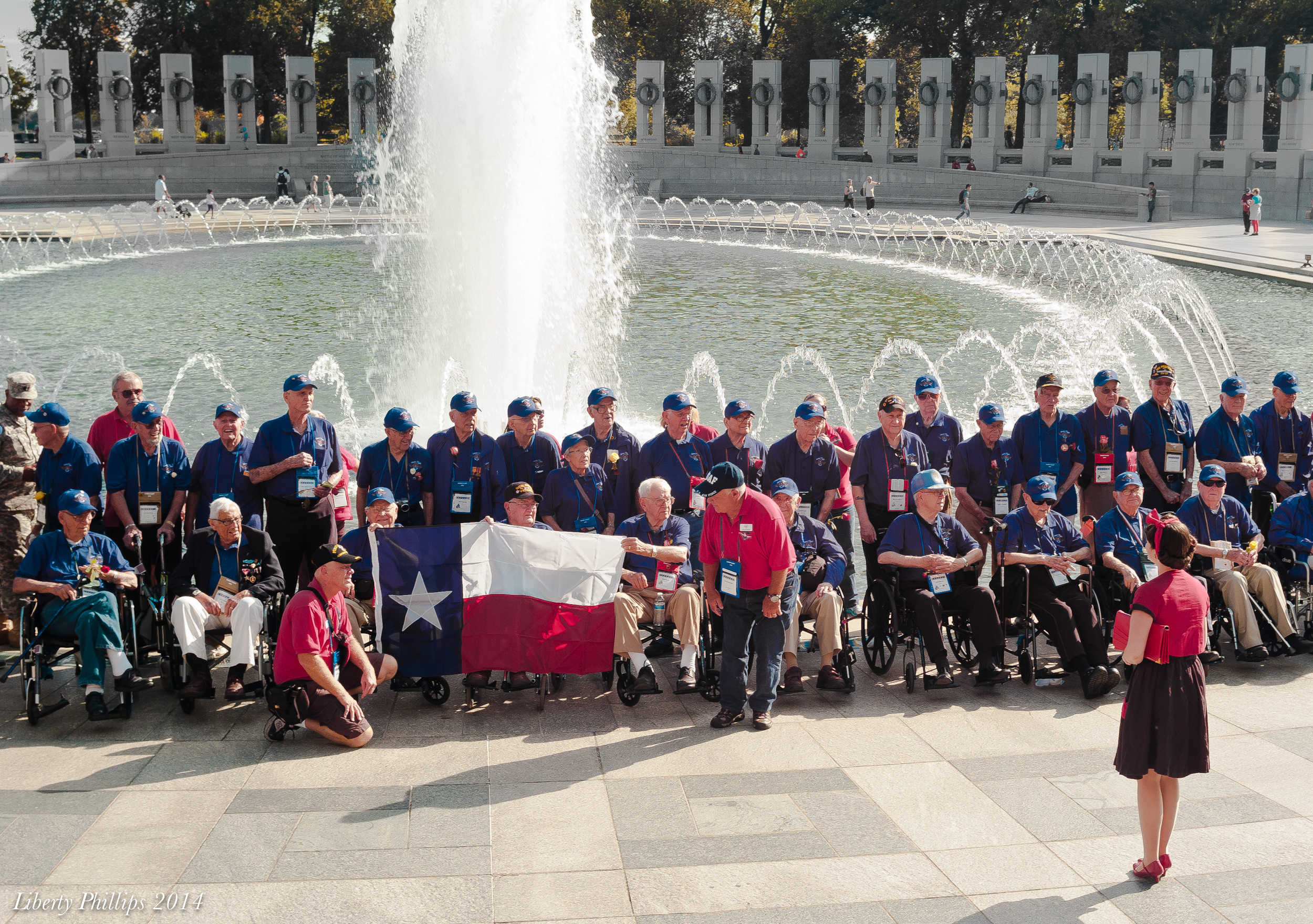 Faith had the honor of singing "God Bless America" with the Honor Flight from her own home state -Texas.