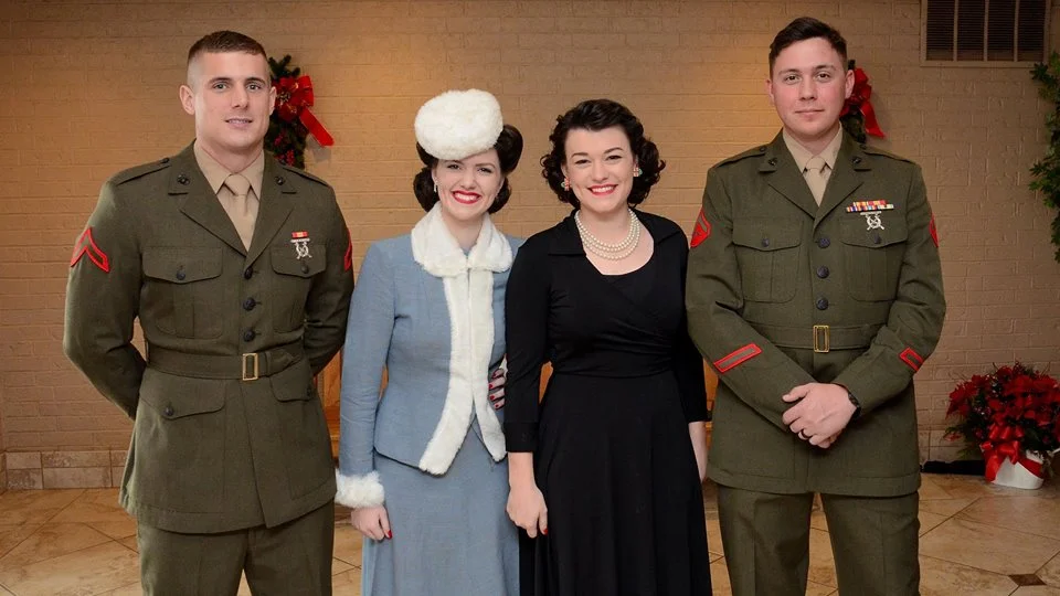 Faith and Jubilee with two of our Marine Corps representatives. (Photo Credit: Joe Schneider) 