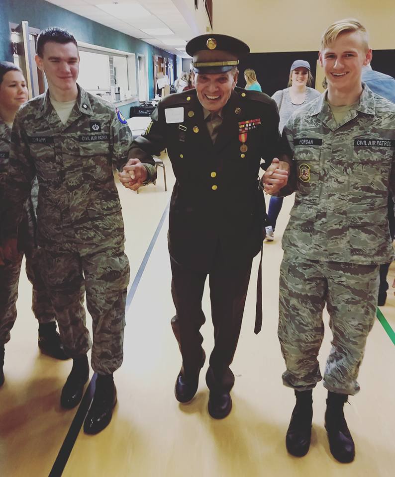 Richard Stanley, US Army, escorted by the local Civil Air Patrol.