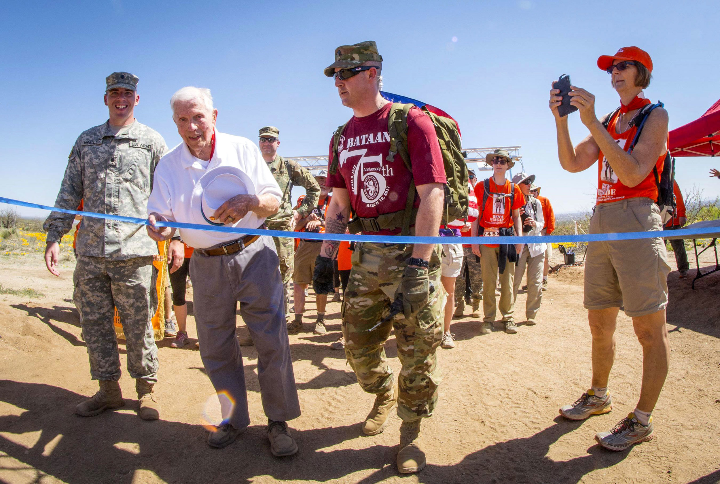Colonel Skardon crosses the finish line at mile 8.5. Photo Credit: Staff Sgt.Ken Scar (his awesome photos can be found in pretty much every article about Col. Ben). 