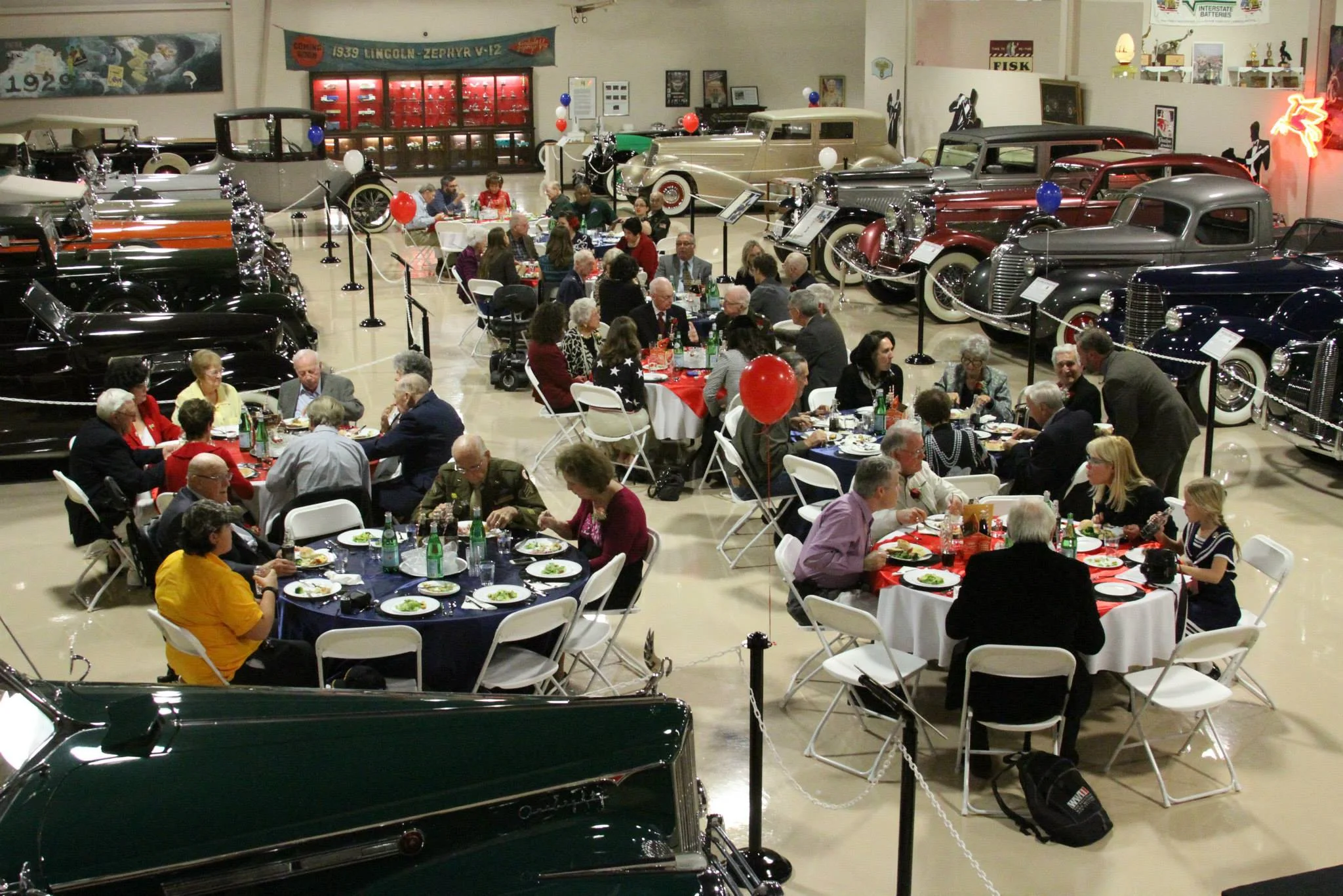 Best location! Dinner between vintage cars. 