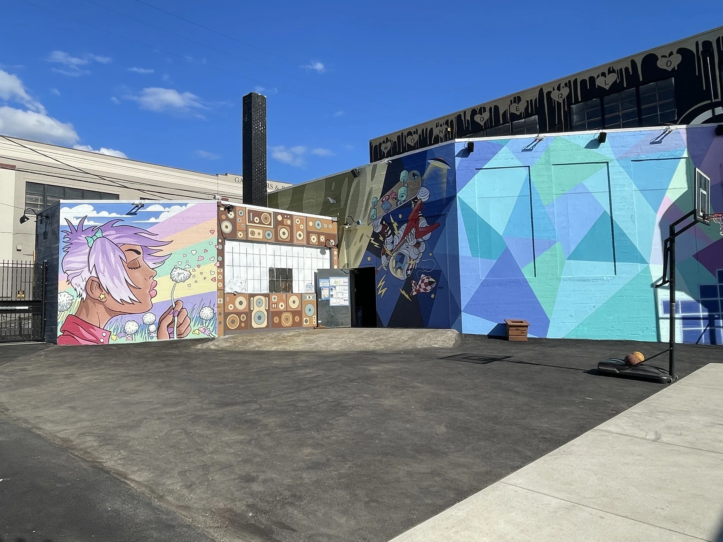 WONDERLOVE: Crafting an Epic Multi-Wall Mural Design