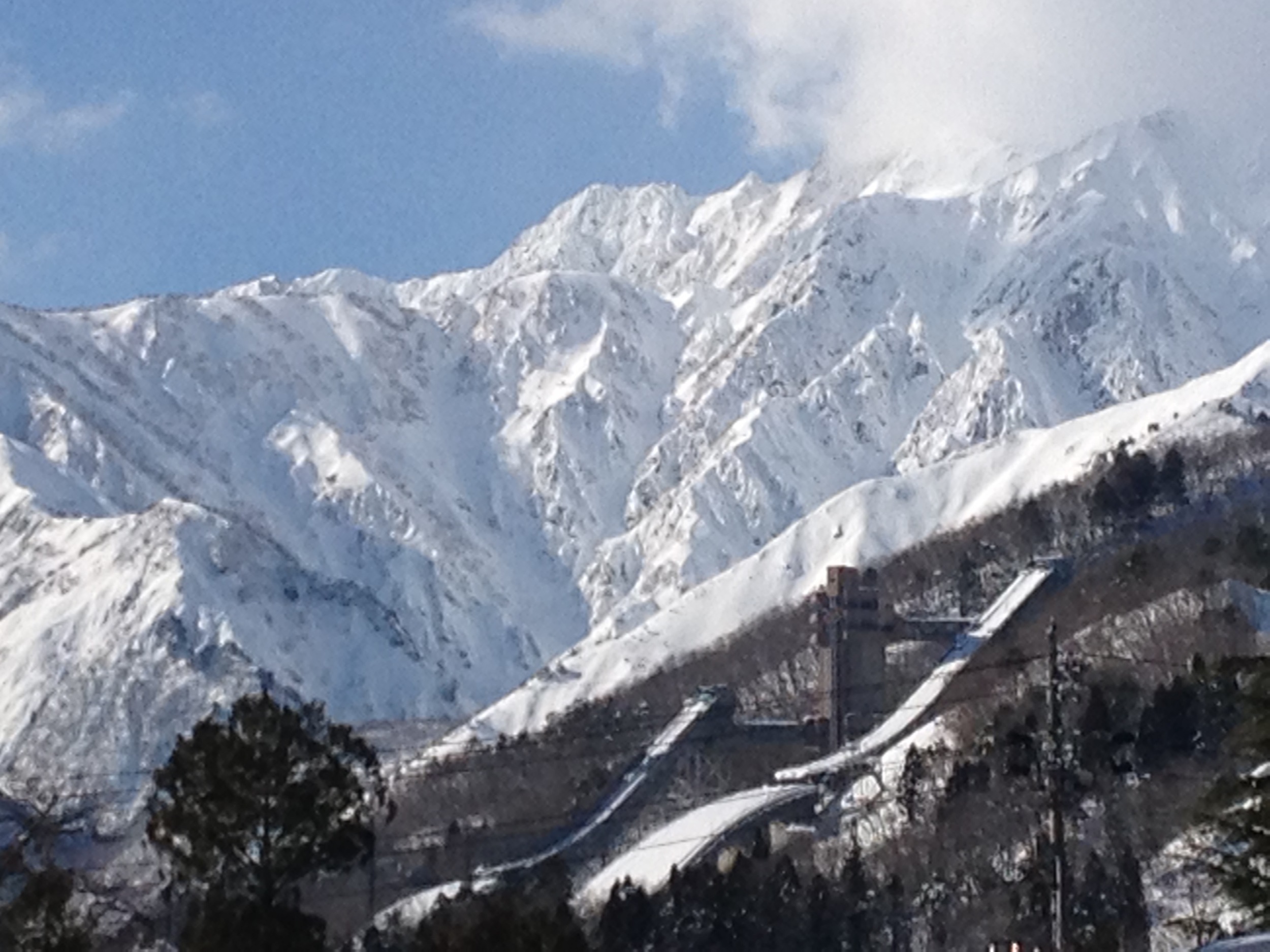 Impressive backdrop of the Japanese Alps, looming over the village of Hakuba