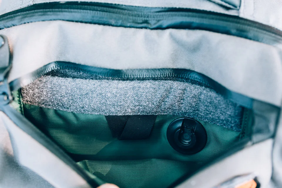 Front Pocket, You can use the magnetic hook for the provided keychain. and the back pocket is magnetic as well. Pockets are big enough for Phones, Hard drives, Snacks. 