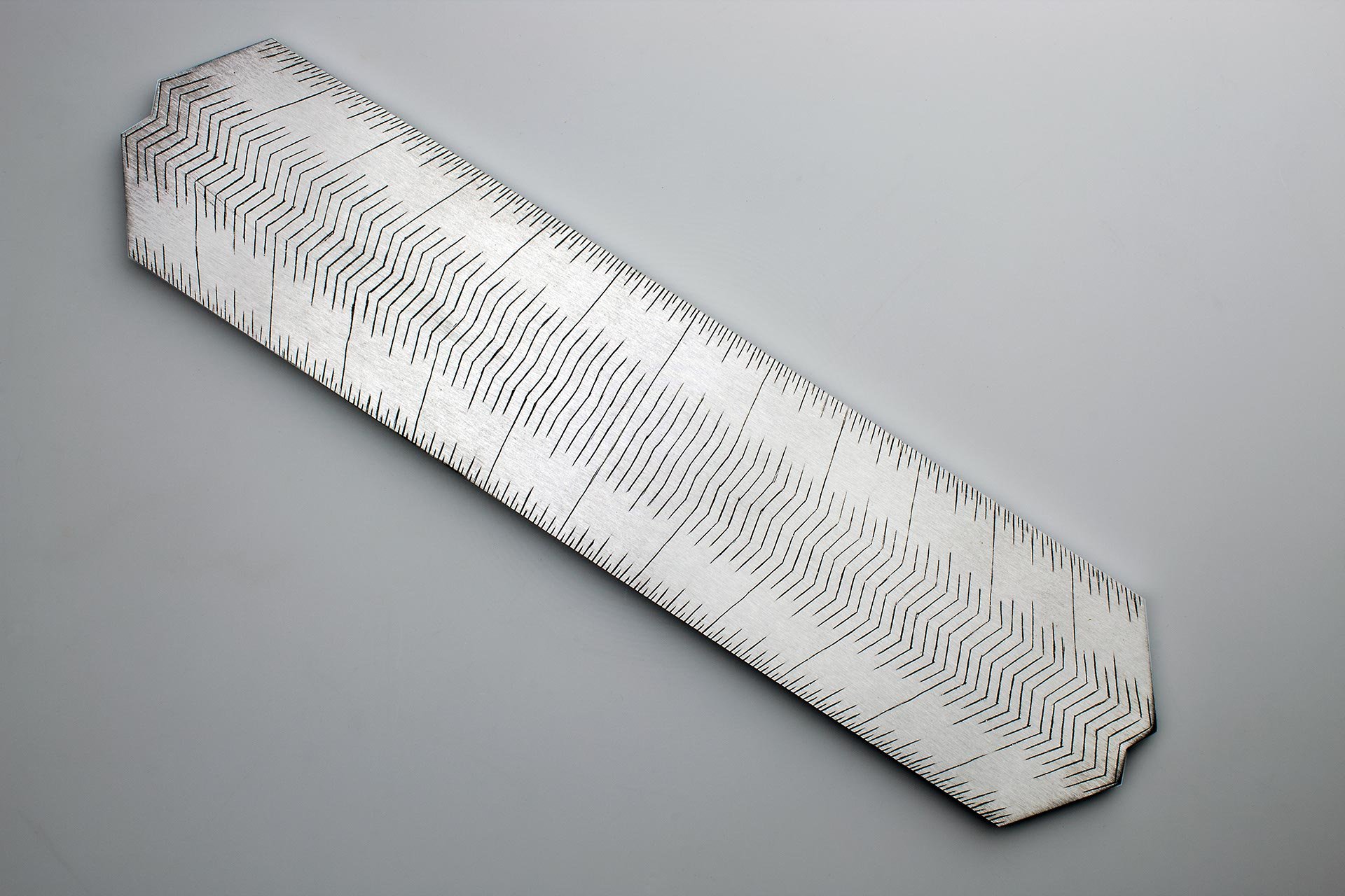 Instrument #94, hand engraved aluminum and ink, 11.625" x 2.625" x .25"