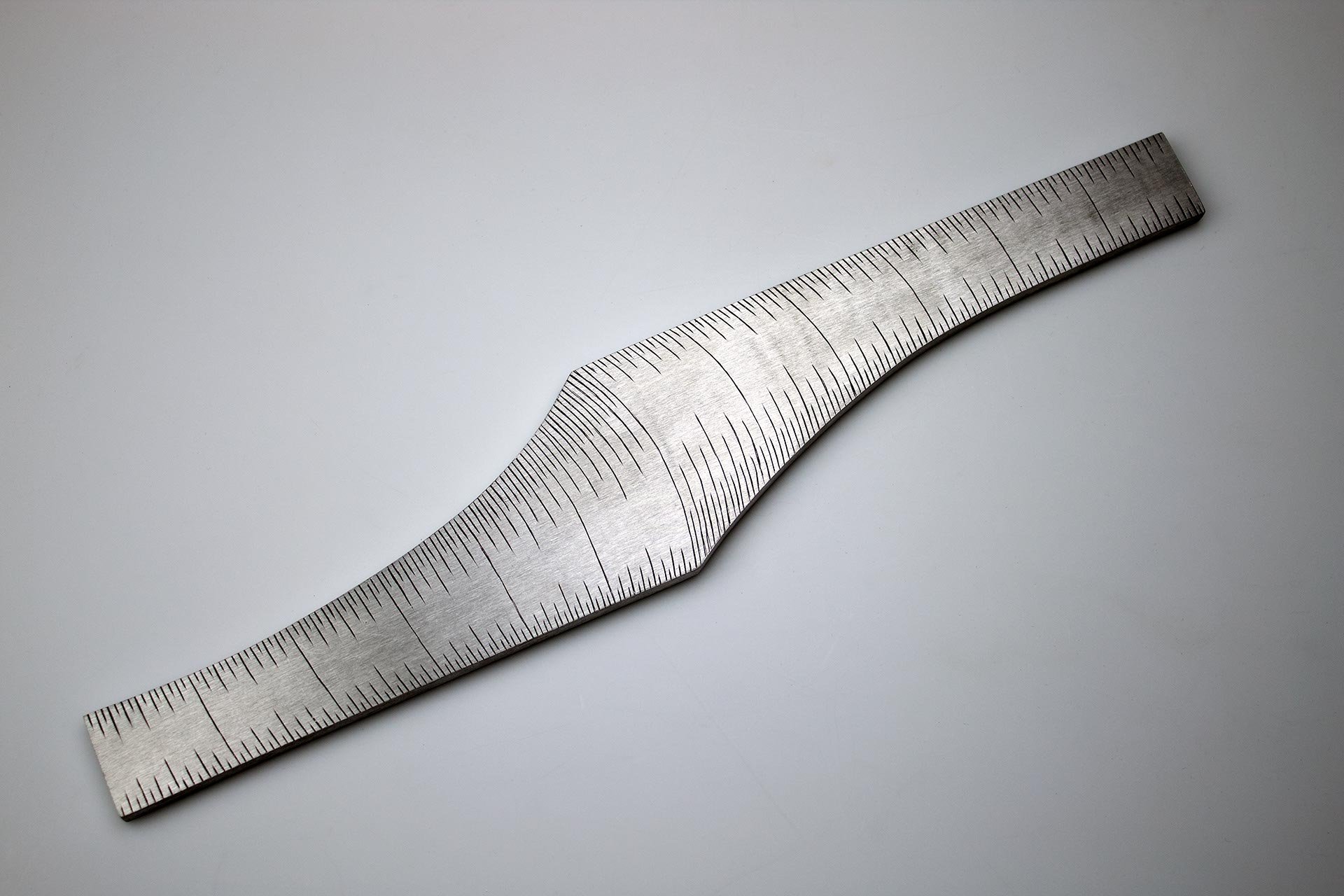 Instrument #57, hand engraved aluminum and ink, 12” x 2.375" x .25" 