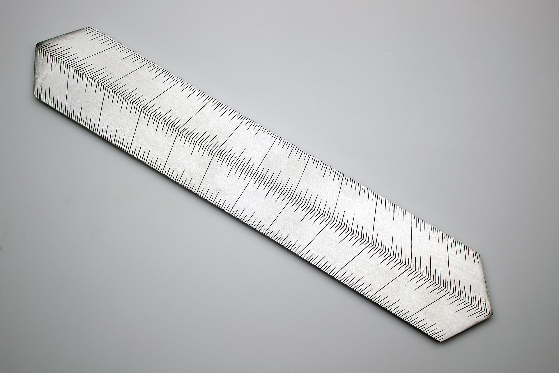 Instrument #2, 11.75" x 2" x .25", hand engraved aluminum and ink.