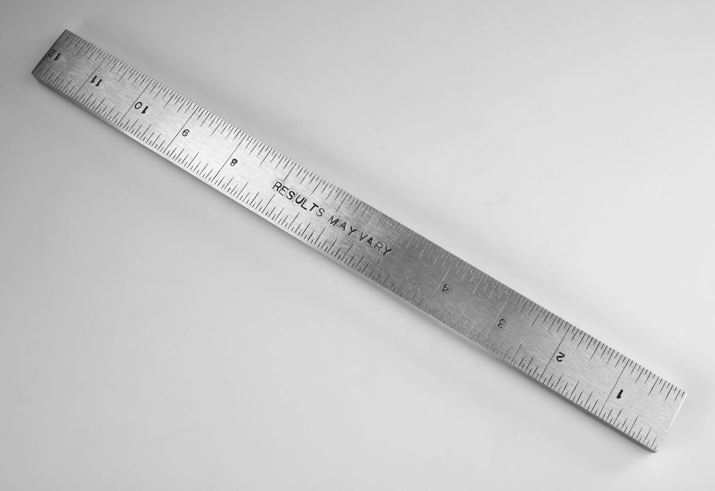 Instrument #400, 0.25" x 1" x 12", hand engraved on aluminum and ink.