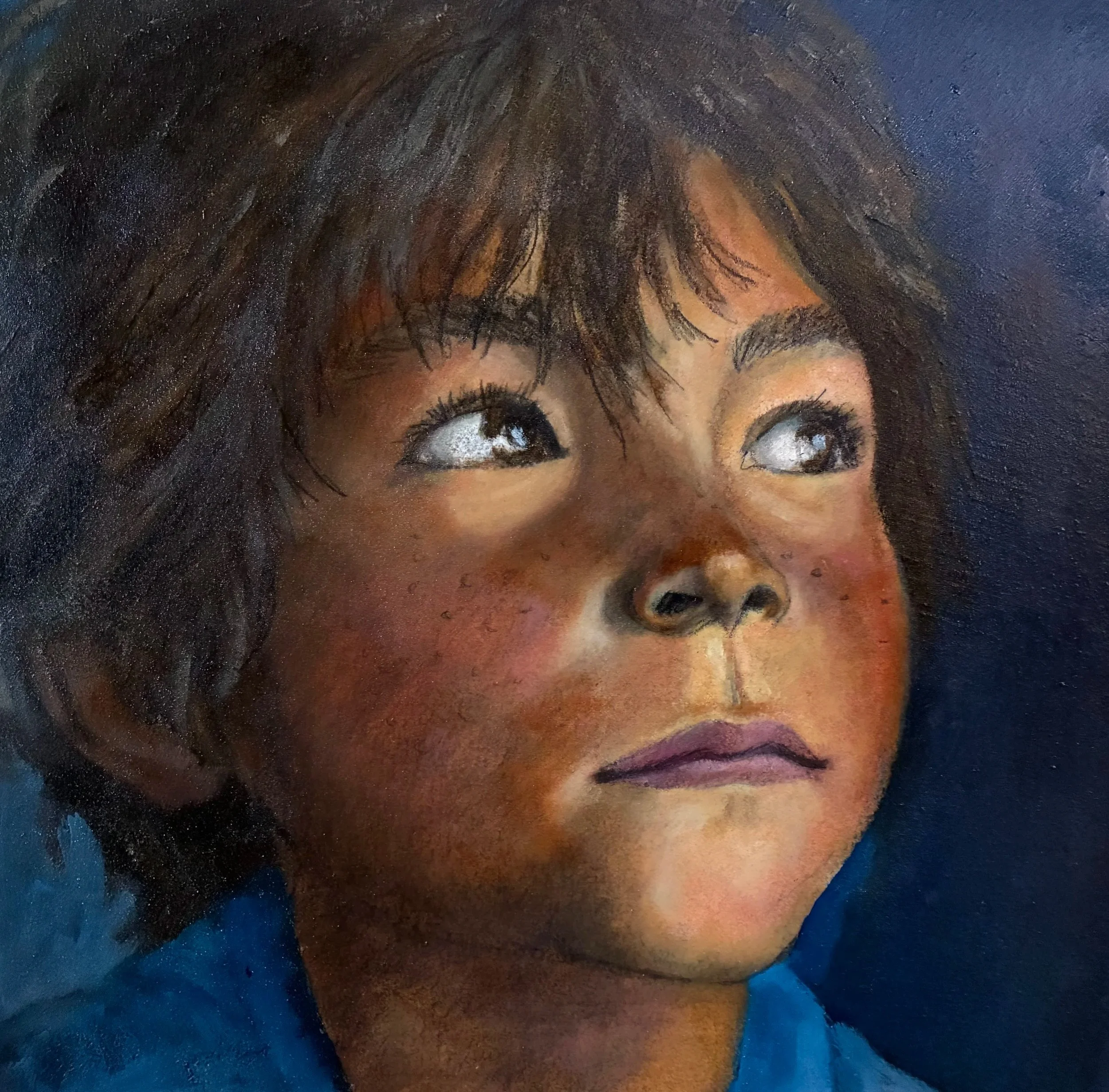 #19 Prompt: young Indigenous boy looking up and to the right