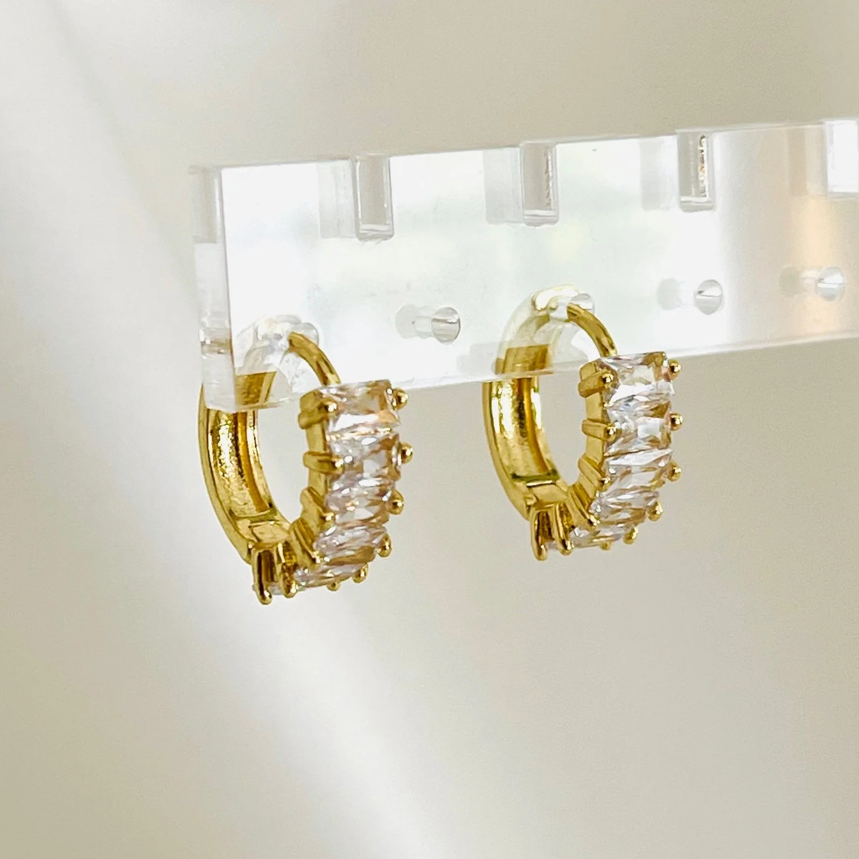 The Crystal Baguette Huggie Hoops
