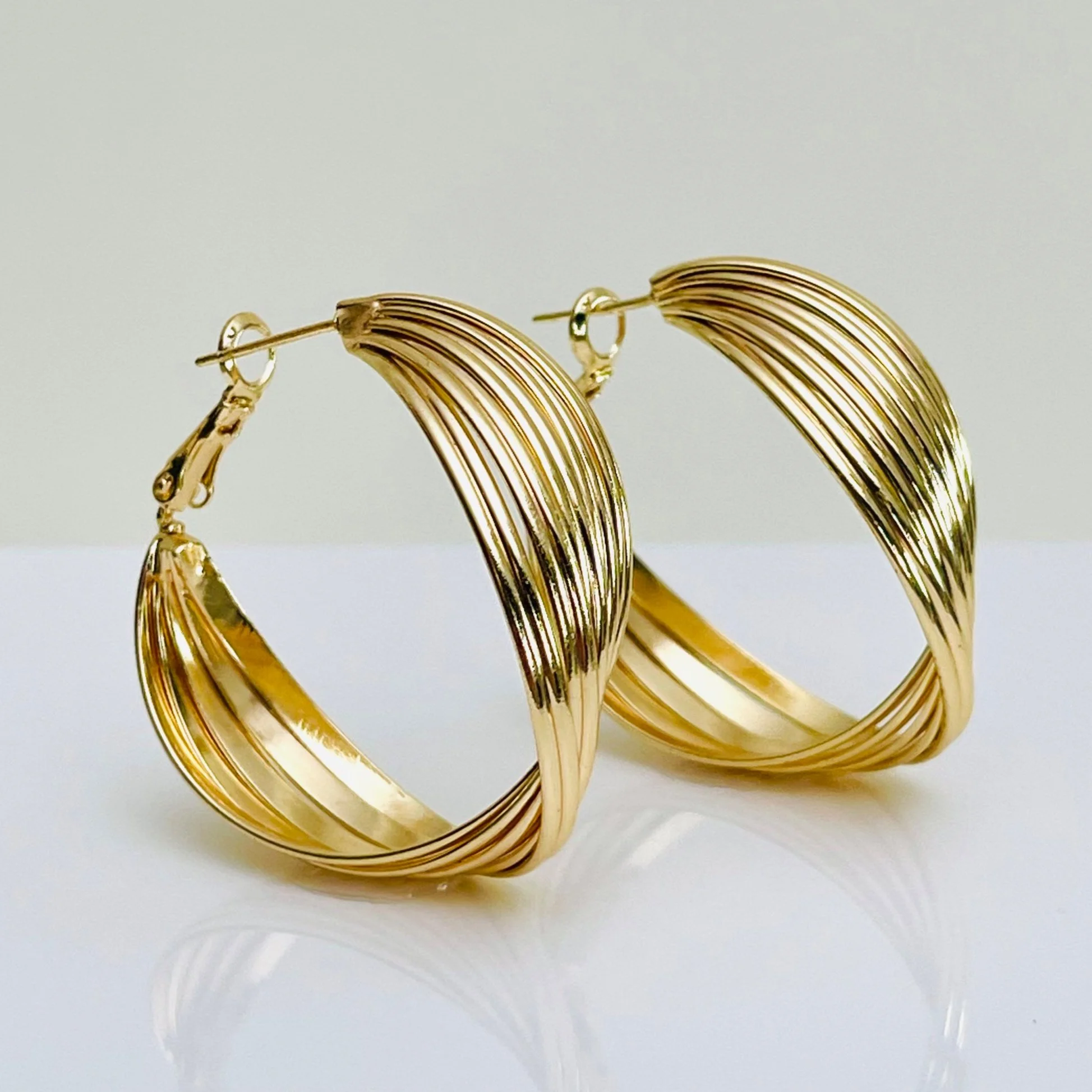 The Golden Bamboo Twist Hoops