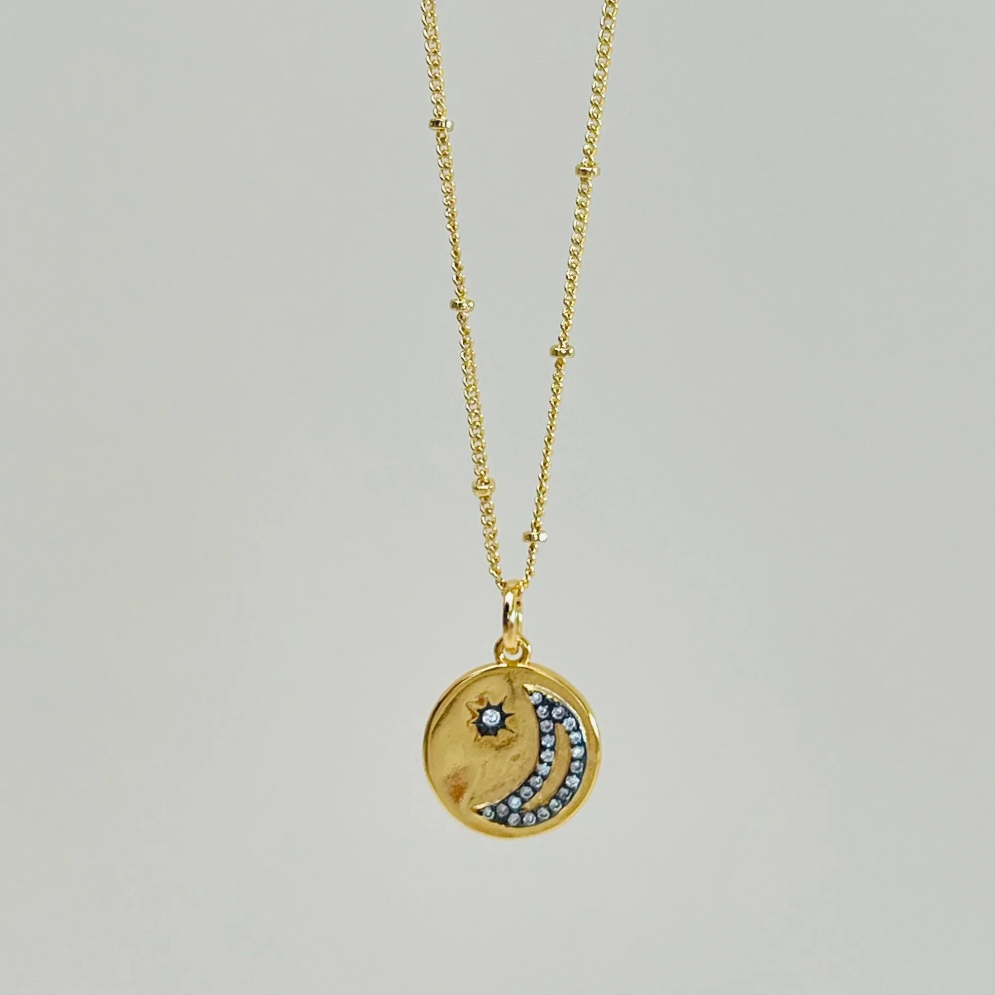 Golden Pave Crescent Crest Pendant
