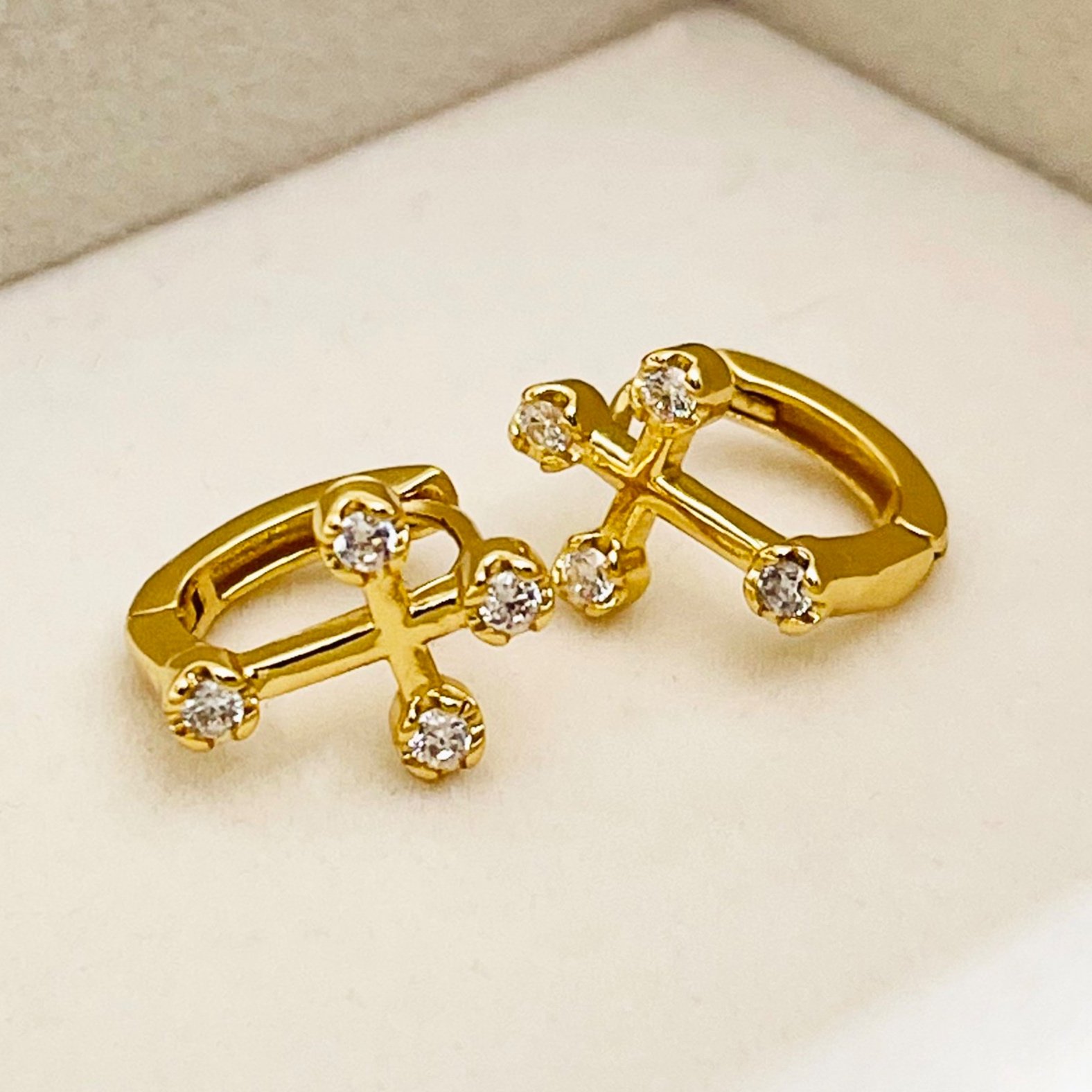 The Golden Pave Cross Mini Hoops