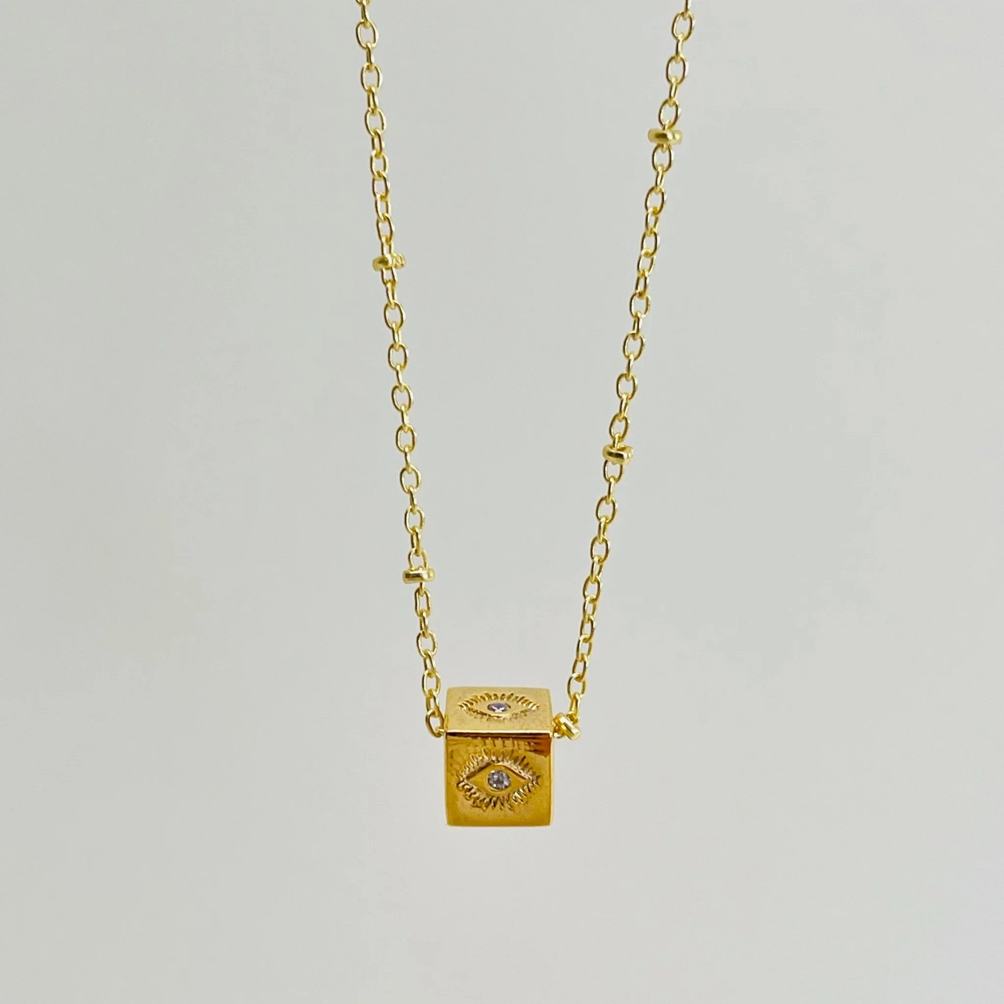 Golden Evil Eye Crystal Cube Pedant