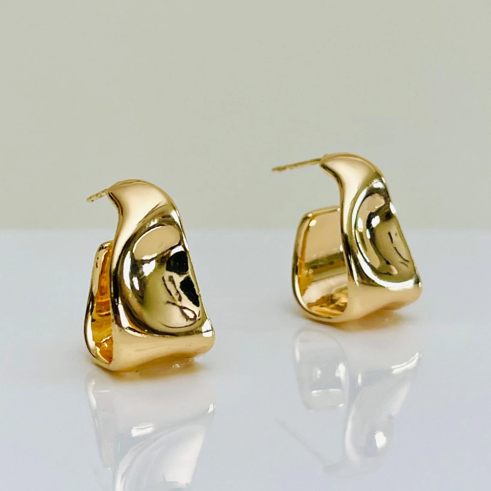 The Golden Thumbprint Swirl Studs
