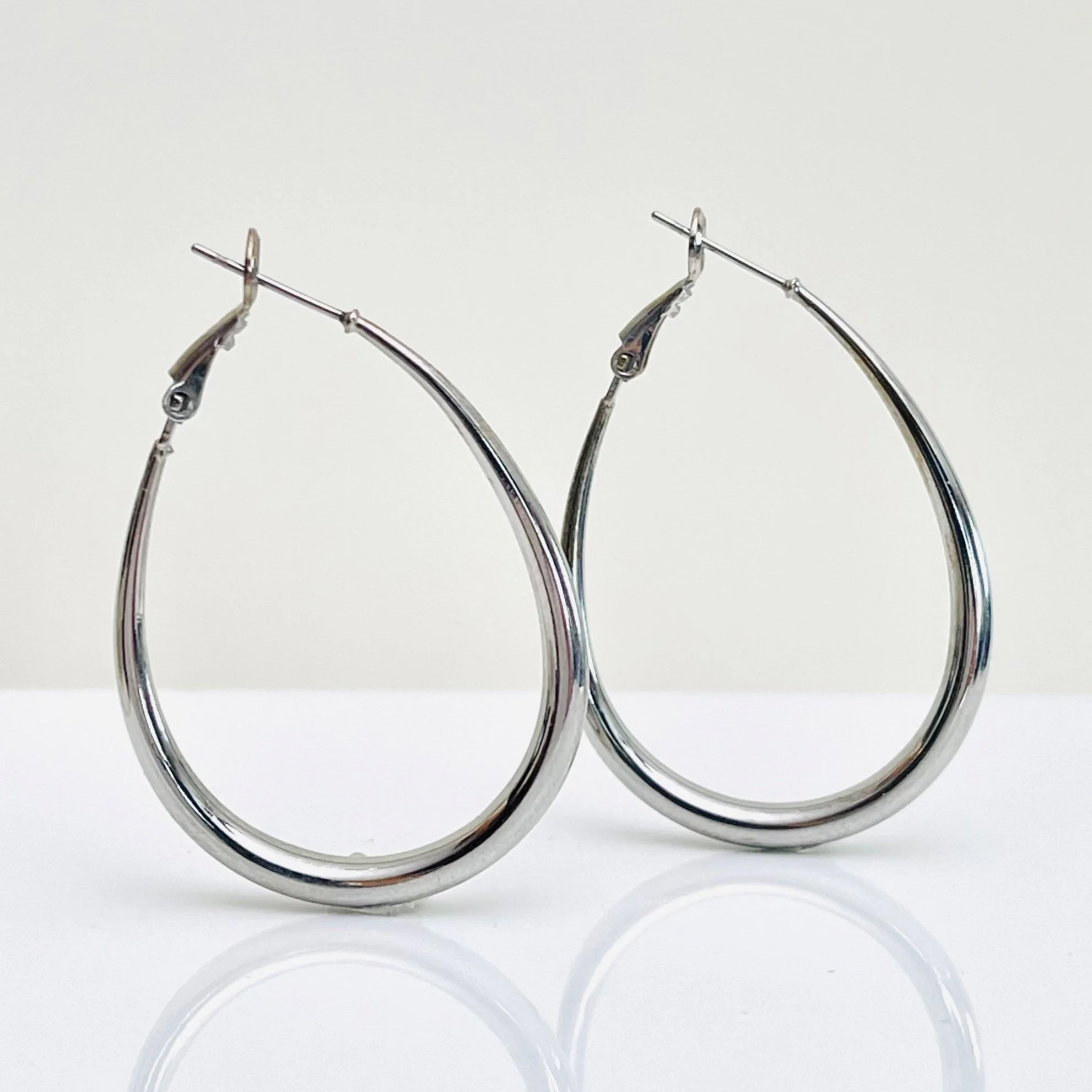 The Silver Oval Drop Hoops