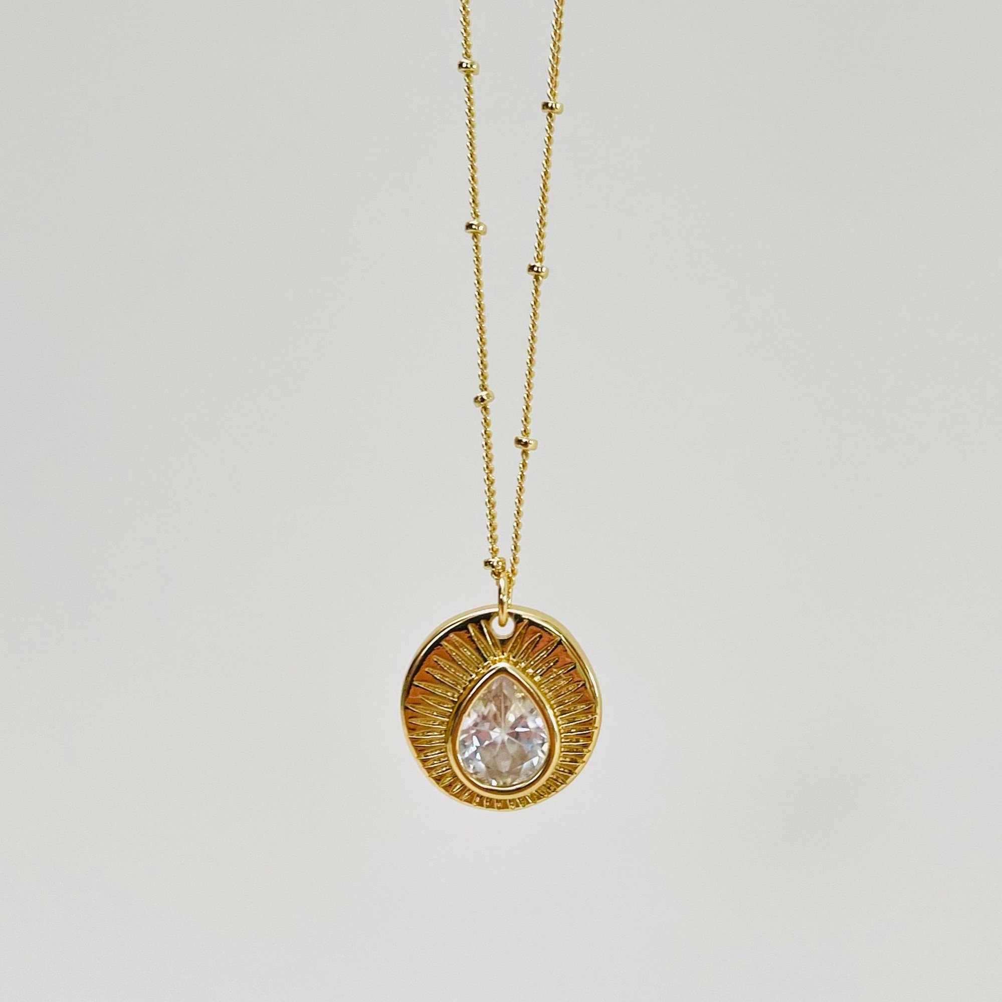Sunburst Teardrop Crest Pendant