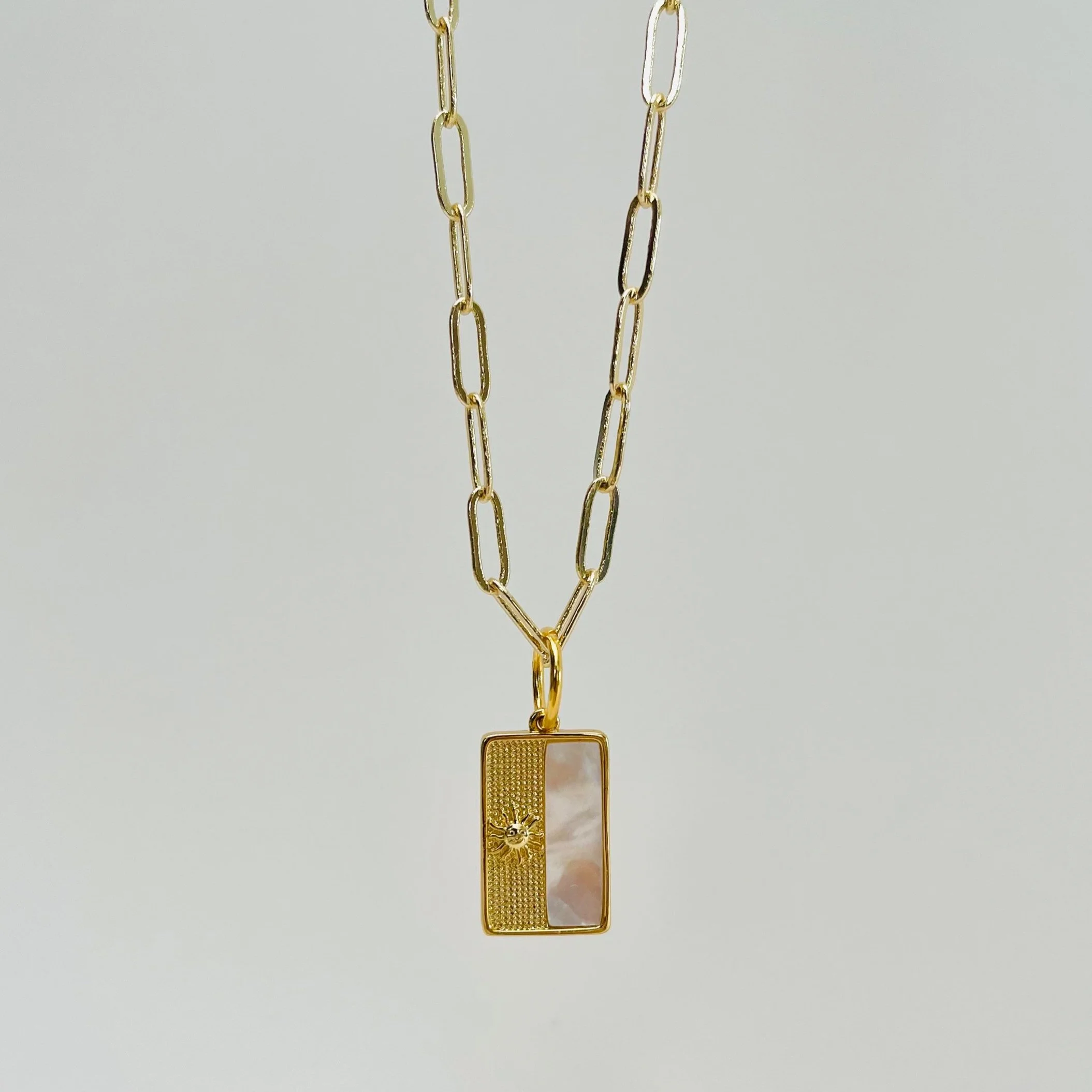 White Mother of Pearl Sun Dog Tag Pendant