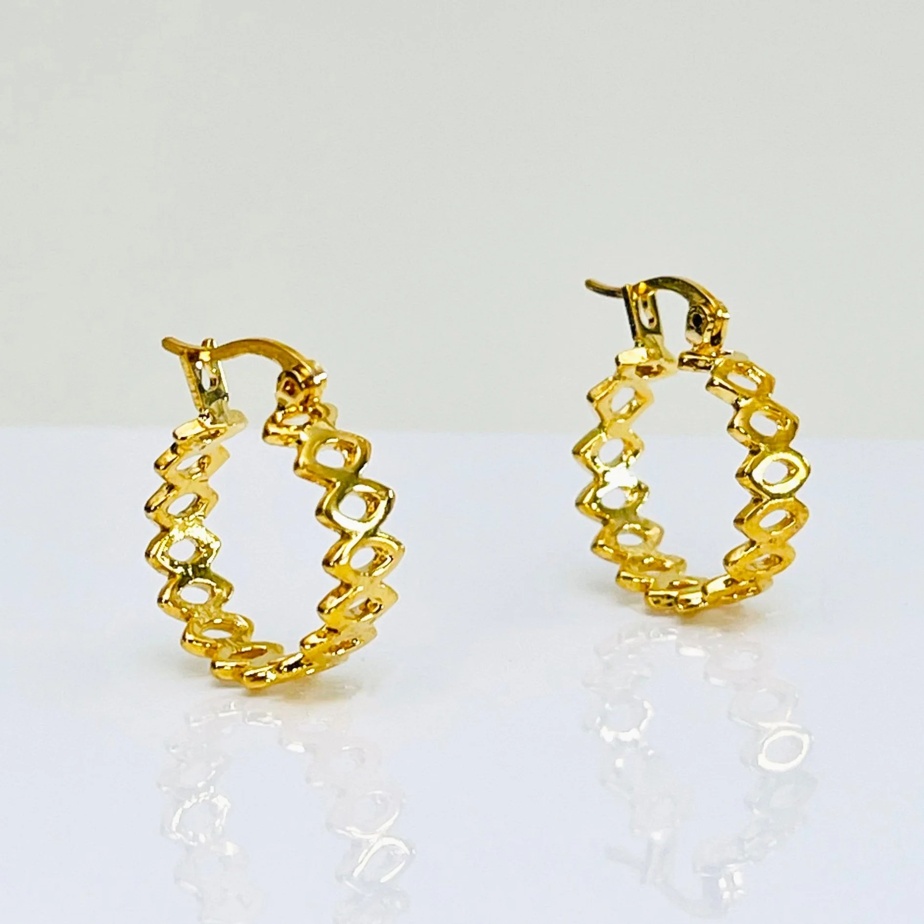 The Golden Marquise Cluster Hoops