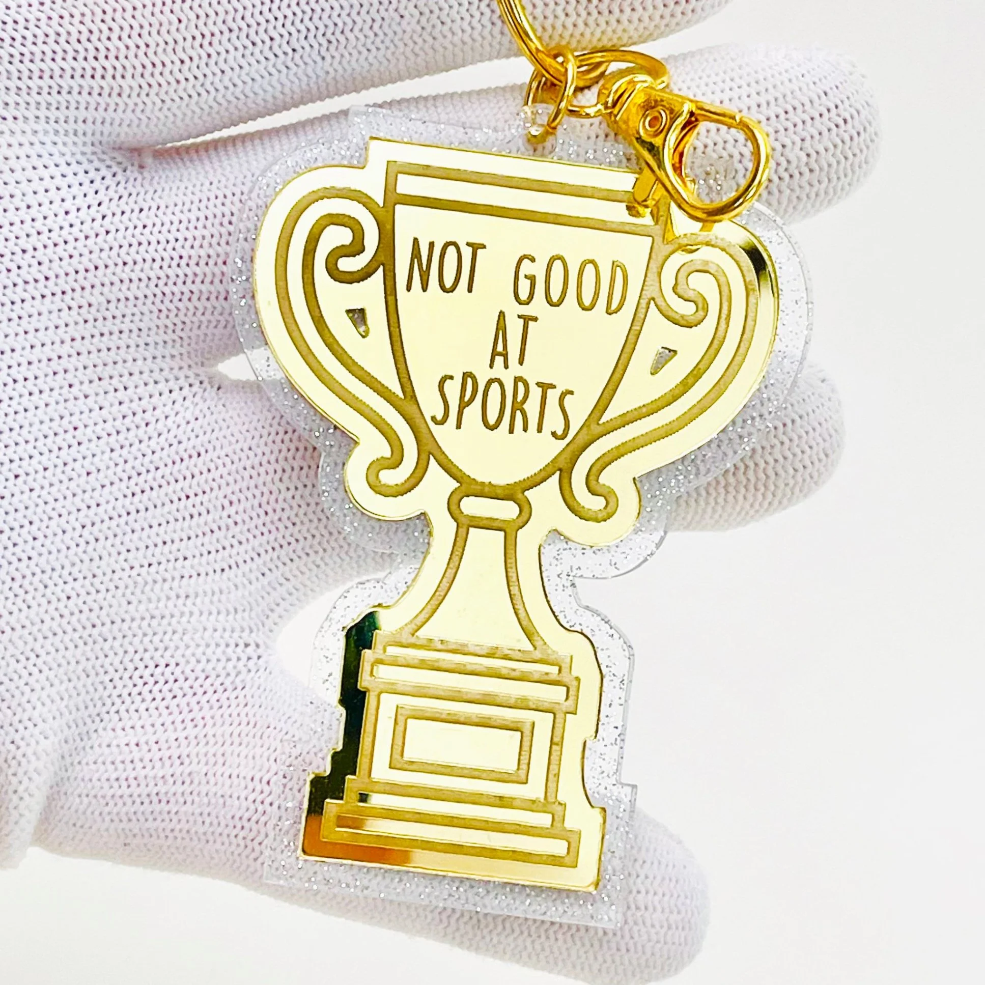 Not Good At Sports Gold Trophy
