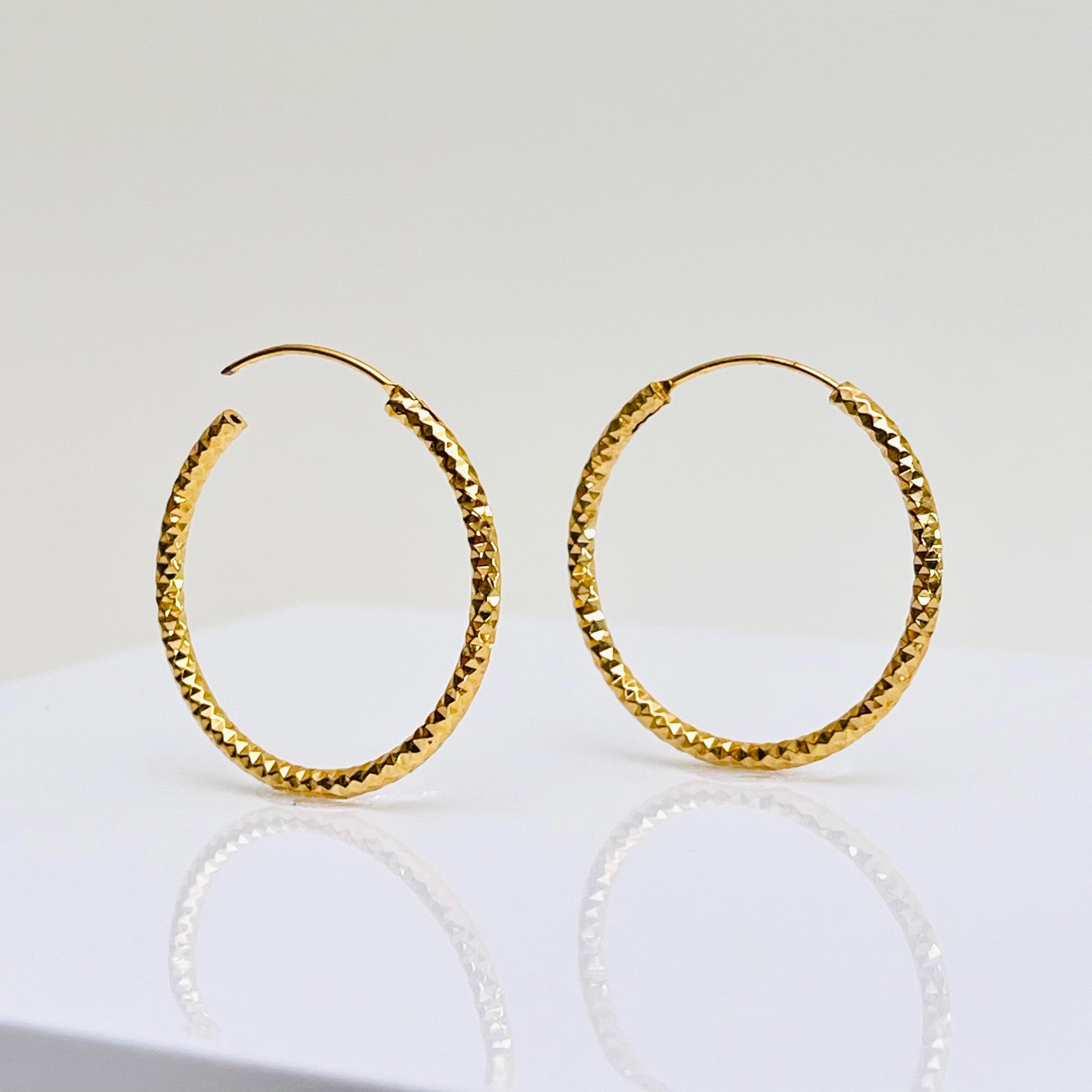 The Hammered Gold Medium Tube Hoops