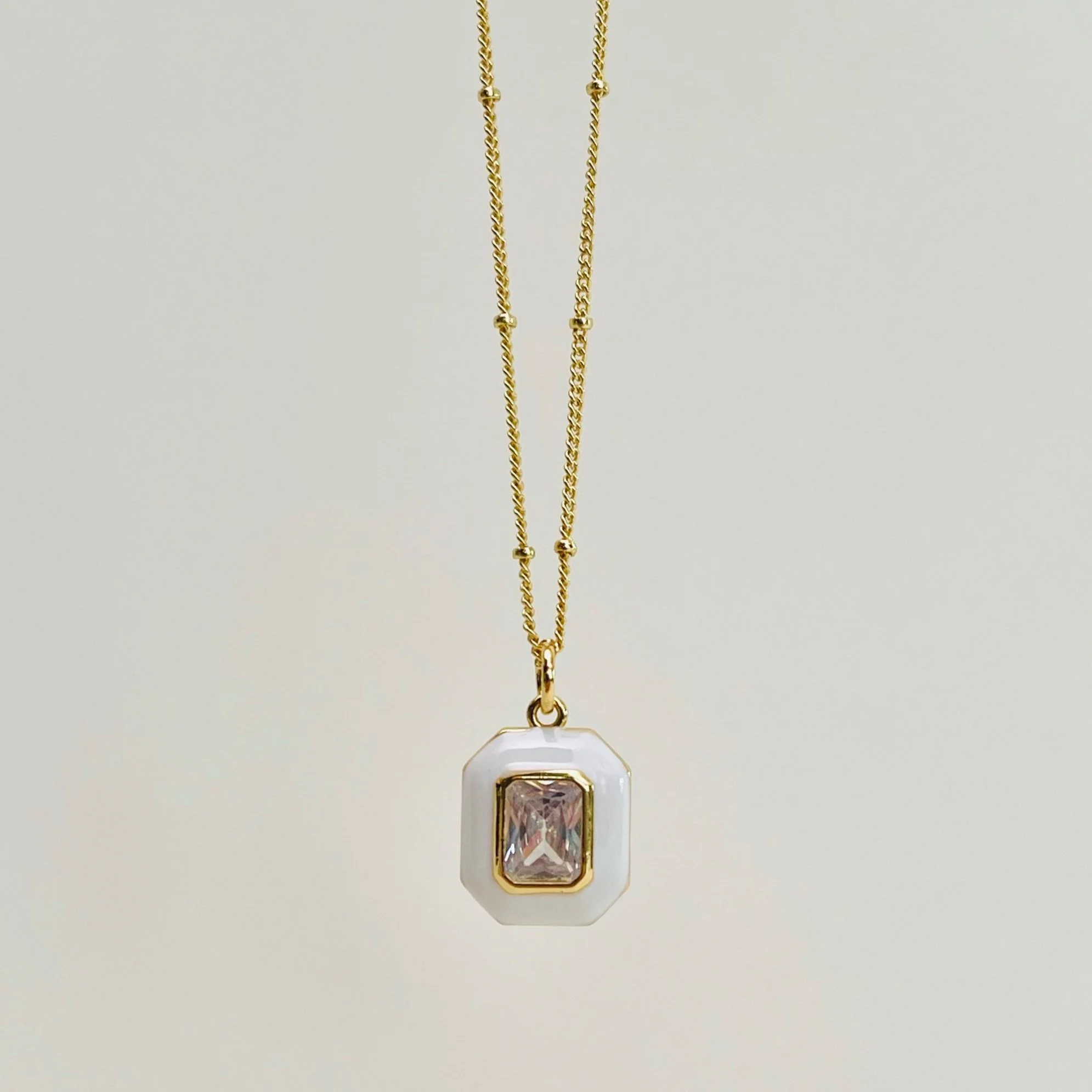 White Enamel Emerald Crystal Pendant