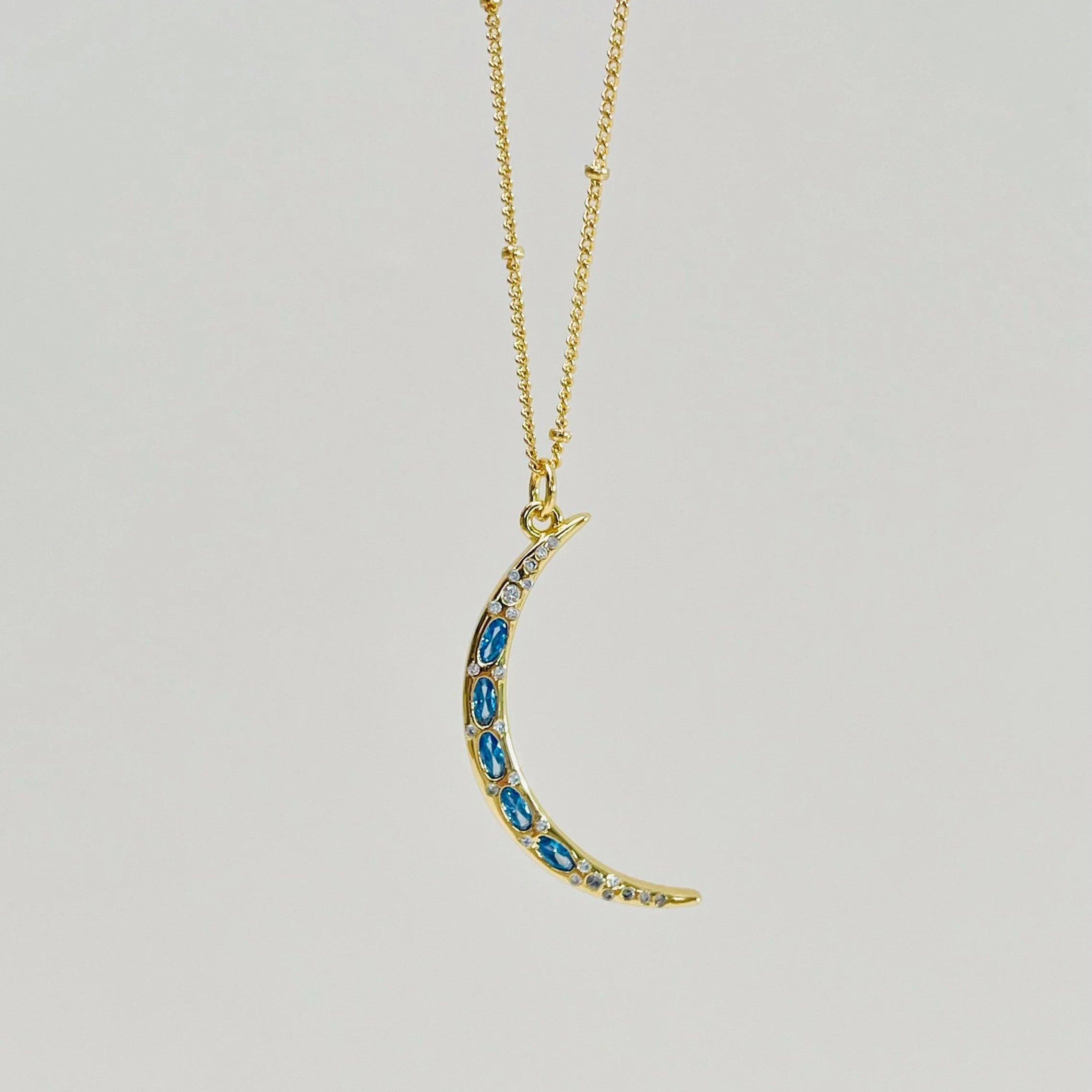 Blue Topaz Crystal Crescent Moon Drop Pendant