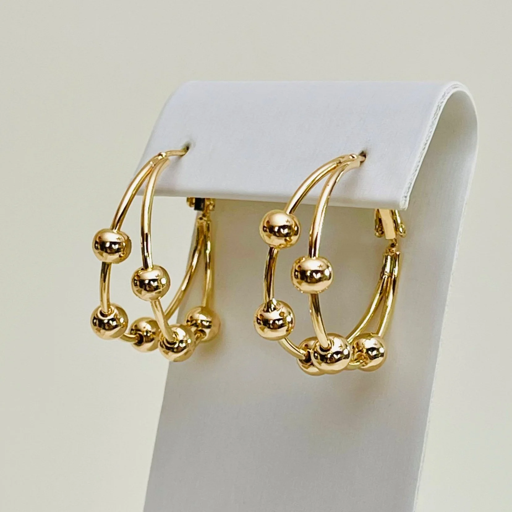 The Golden Barbell Hoops
