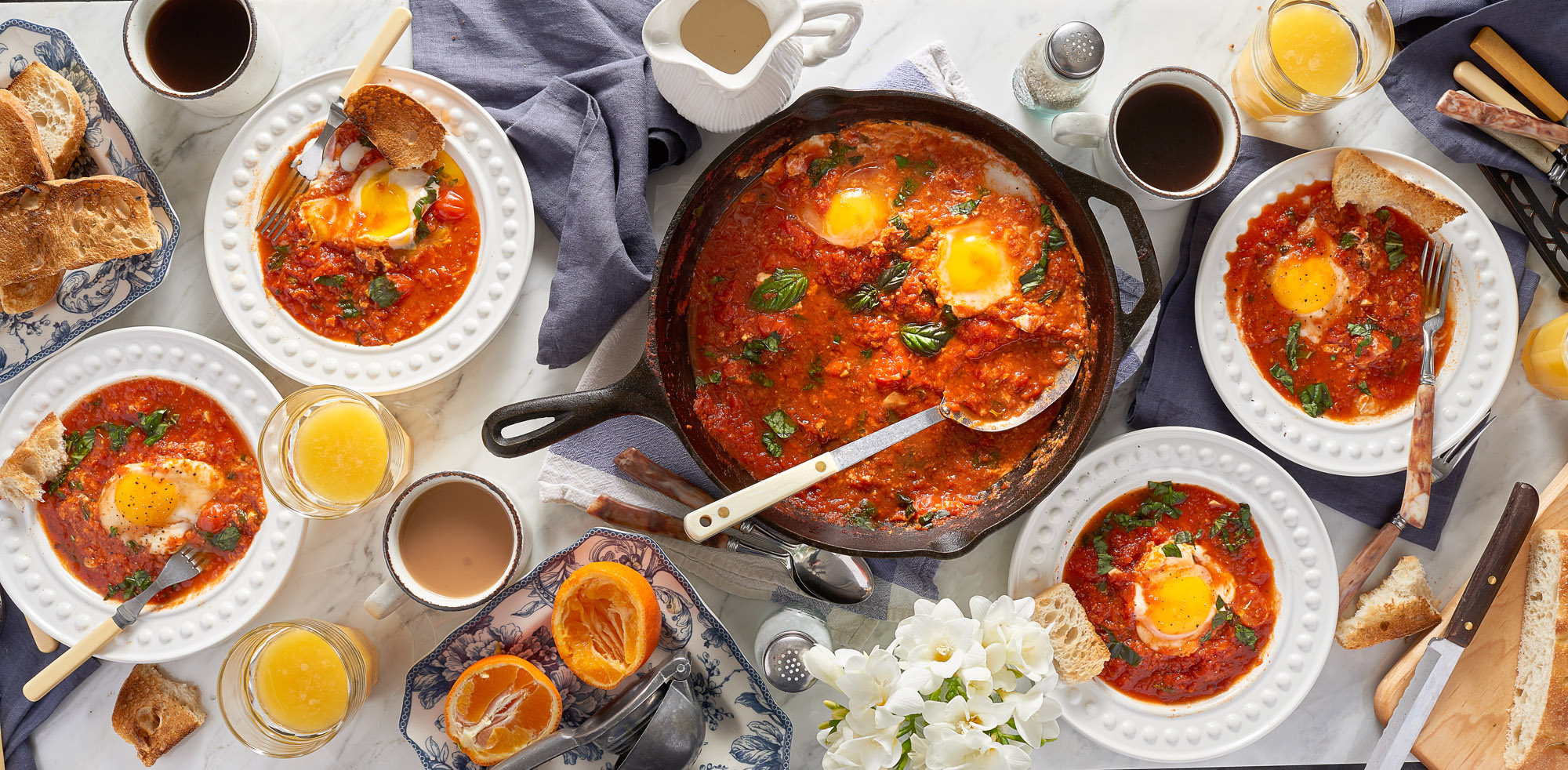 Big breakfast with eggs marinara, coffee and orange juice