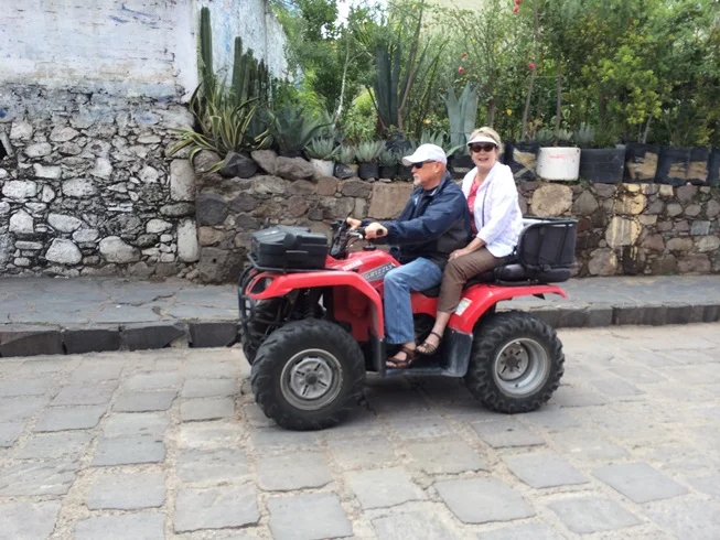 These were common to see on the streets with the cars. We saw several with young kids on the back, and kids sitting in the back on someone's lap. This would work great for a family of 4.