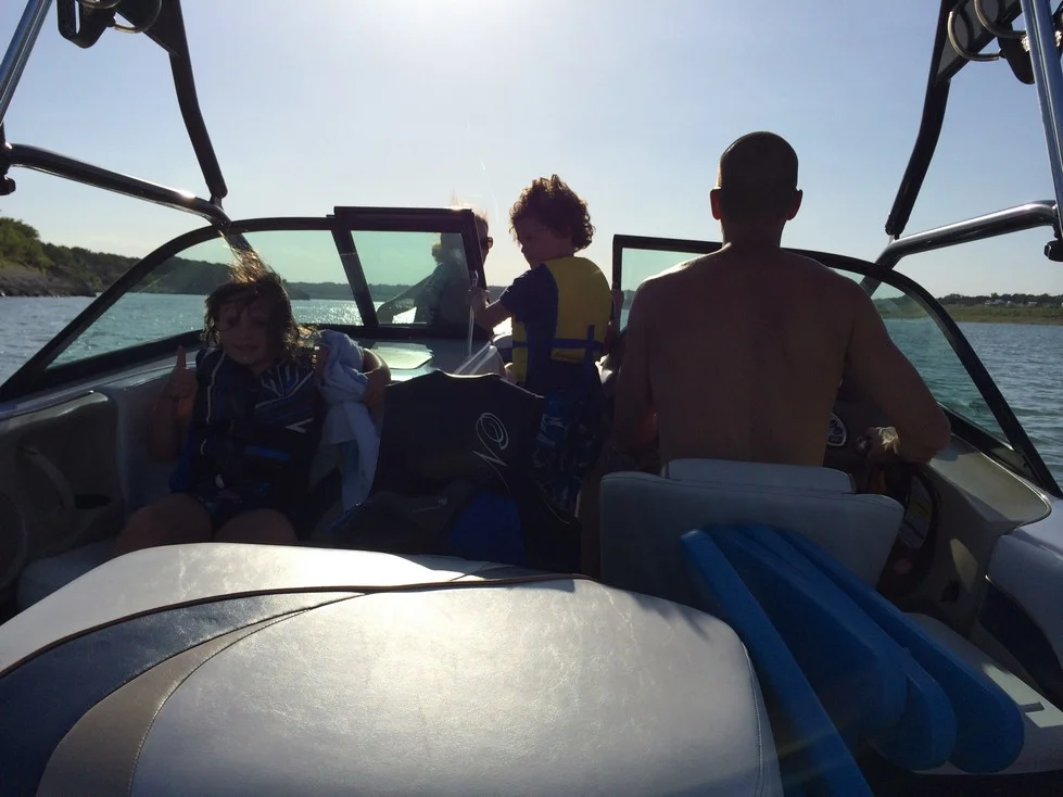 Elle giving the thumbs up in route to our anchor point on Lake Georgetown.