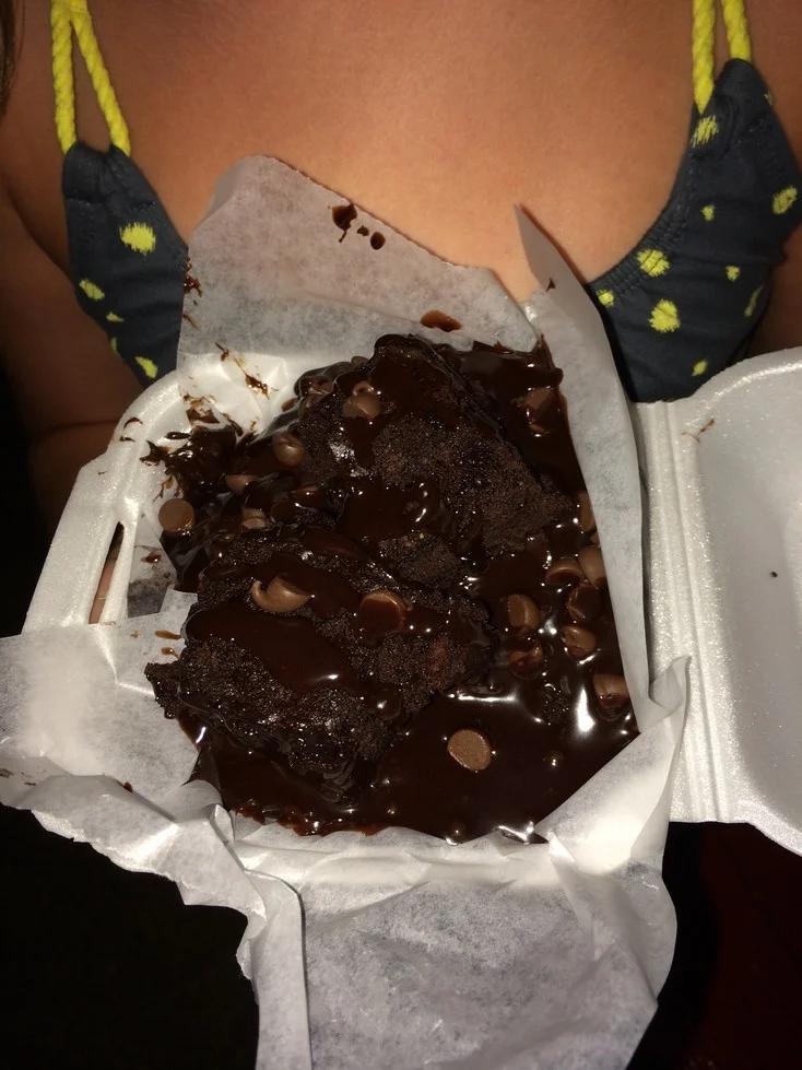 This is called the Black Out Donut. It is brownie batter, fudge icing, and chocolate covered brownie bites on top of a donut (yes there is a donut in there).