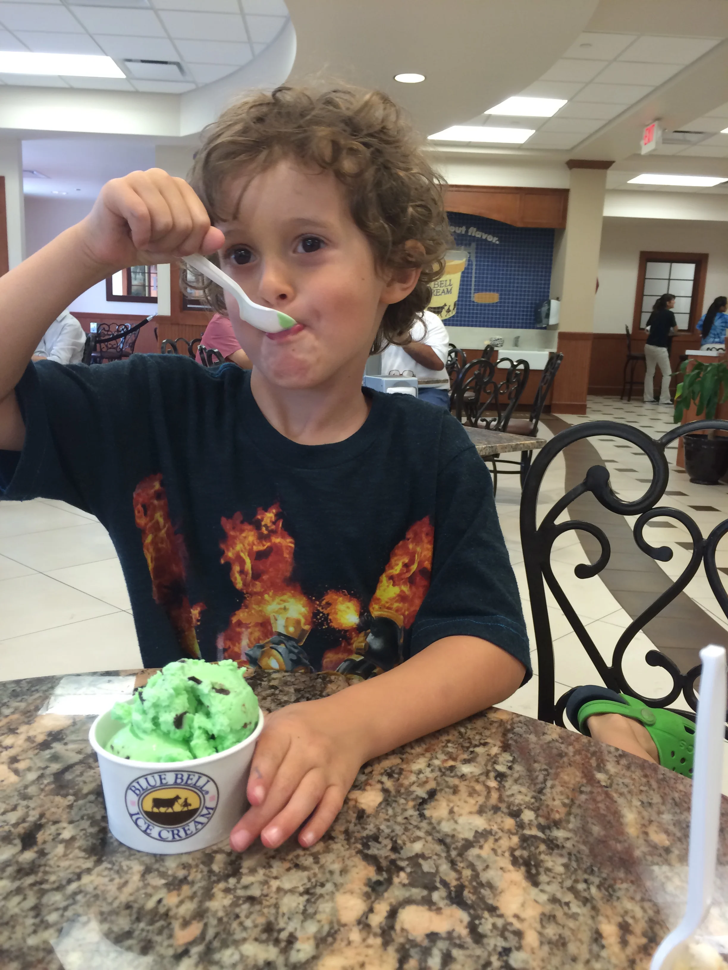 At the end of the tour, everyone got a free scoop. Elle sampled at least half of today's 16 flavors, and the girl behind the counter encouraged her to sample every one of them. (It was the end of the day. Maybe she didn't want to start cleaning!)