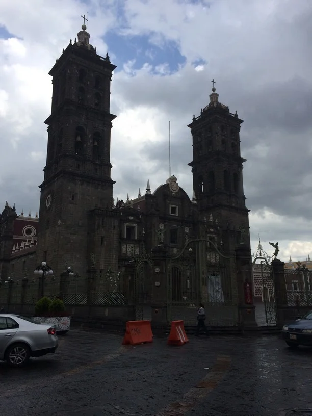 Outside the colonial Roman Catholic Church named Puebla Cathedral