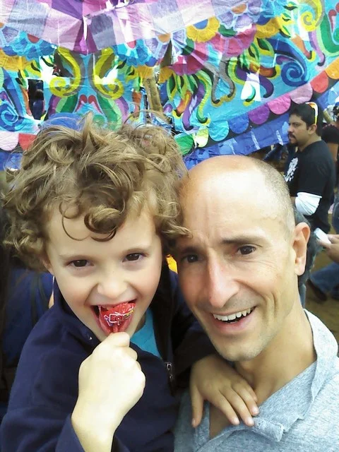 Oh' the curls on this kid (and the scalp on the other)!