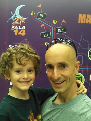 Tag and I at the expo in front of the race map.