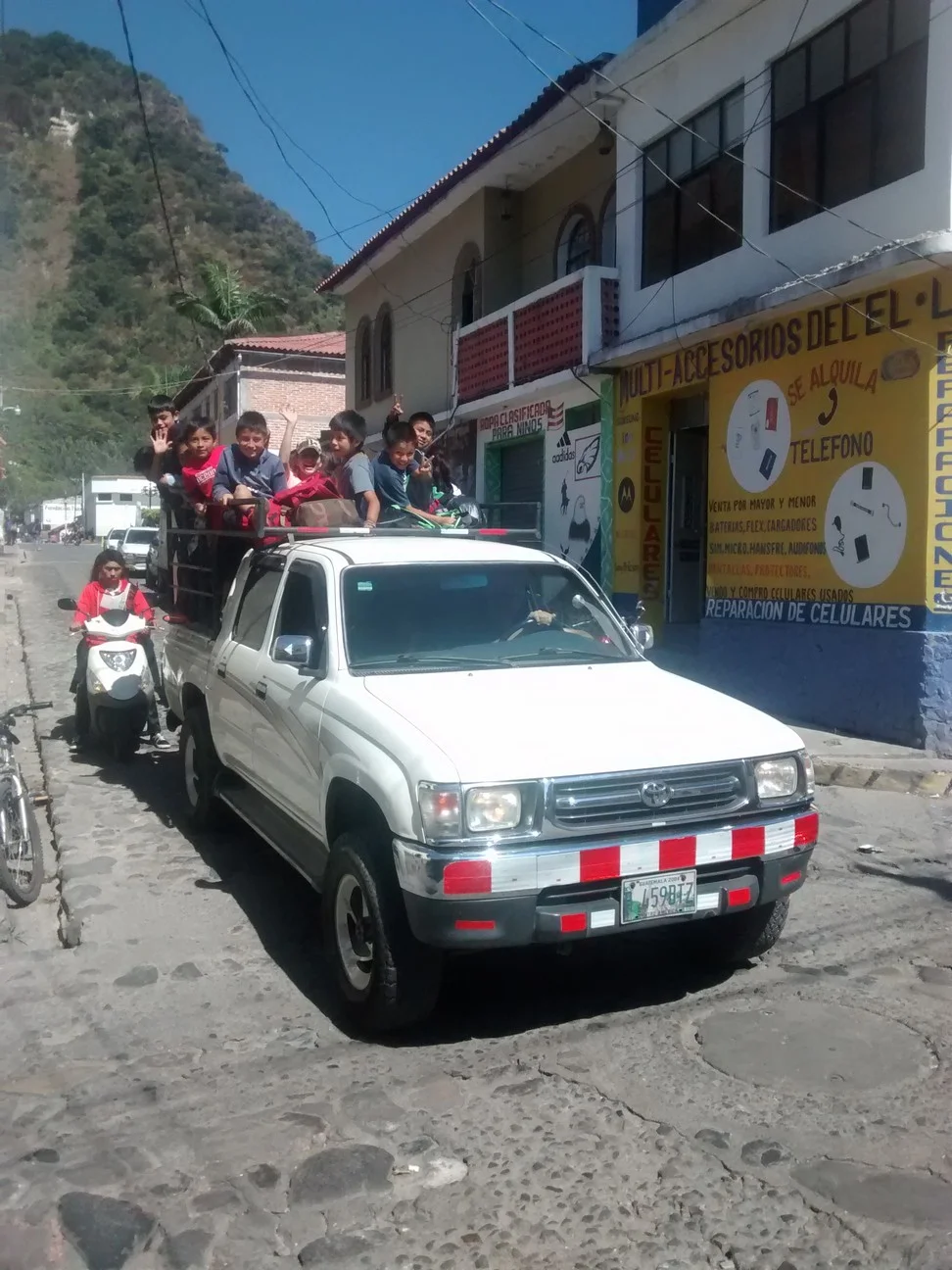 The kids loved high fiving him as we drove past.