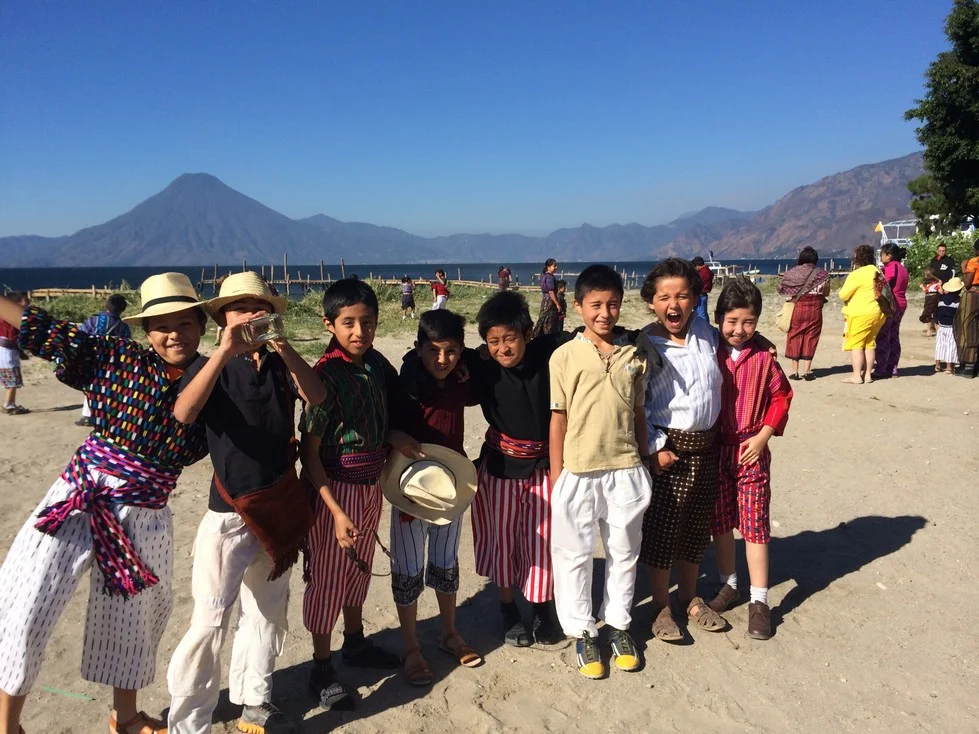 Some of the boys in their traje. Notice the boy second from left's liquor bottle. It's a prop for the presentation later in the day. 