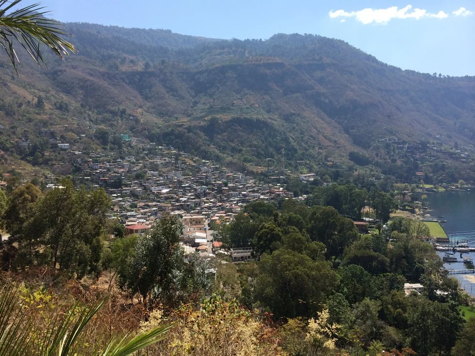 The pueblo of Santa Catarina Palopó. The big patch of green on the water is the town's soccer field. 
