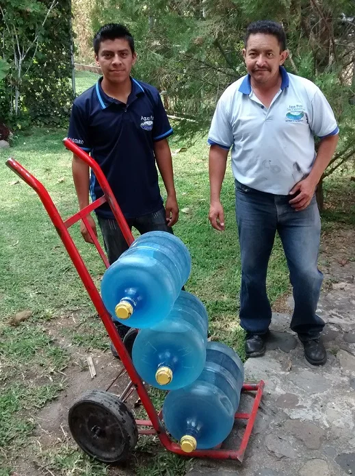 Our weekly delivery of drinking water. 3 bottles costs $3.75 delivered.