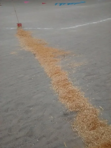 Sawdust was stacked as makeshift speed bumps. 