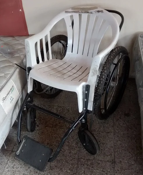 Apparently if you cut the legs off of a plastic lawn chair it will fit perfectly on a wheel chair base.