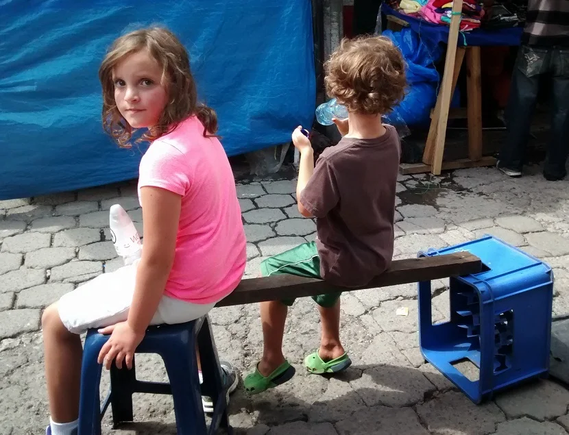 I do not recommend repeating this hack. When my daughter stood up she inadvertently slid the wood off the stool and my son hit the ground. Worse, he spilled the water and I was thirsty.