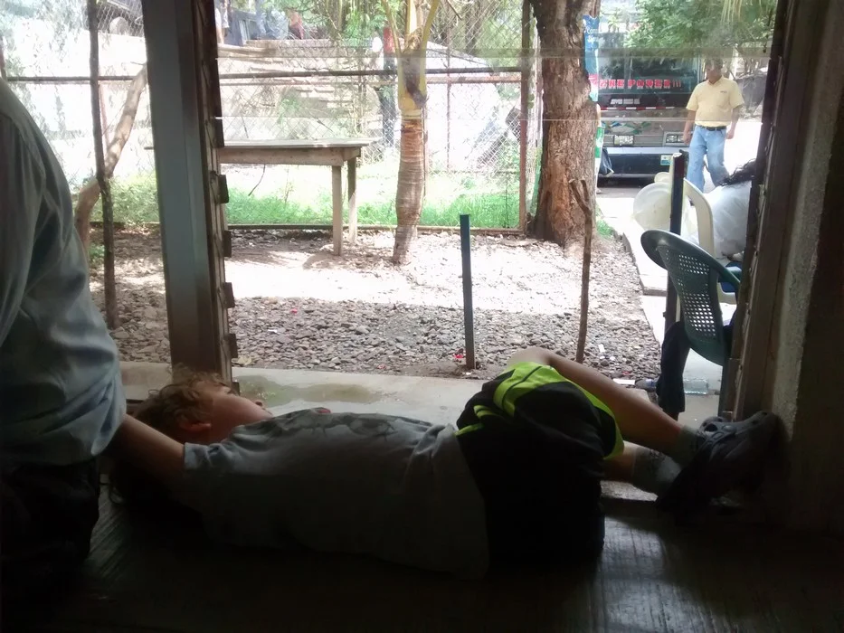 This was taken in the customs building in Nicaragua. There's no AC and very few fans. While I was processing paperwork, Tag decided to do the only thing one can do to manage the heat. He curled up in the shade in front of a broken window that had a slight breeze and stayed very still. He was a trooper!