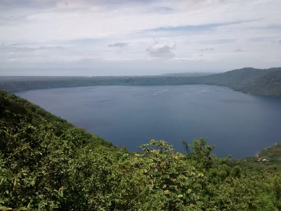 Laguna de Apoyo from above. You can see the shores of Lake Nicaragua in the background.